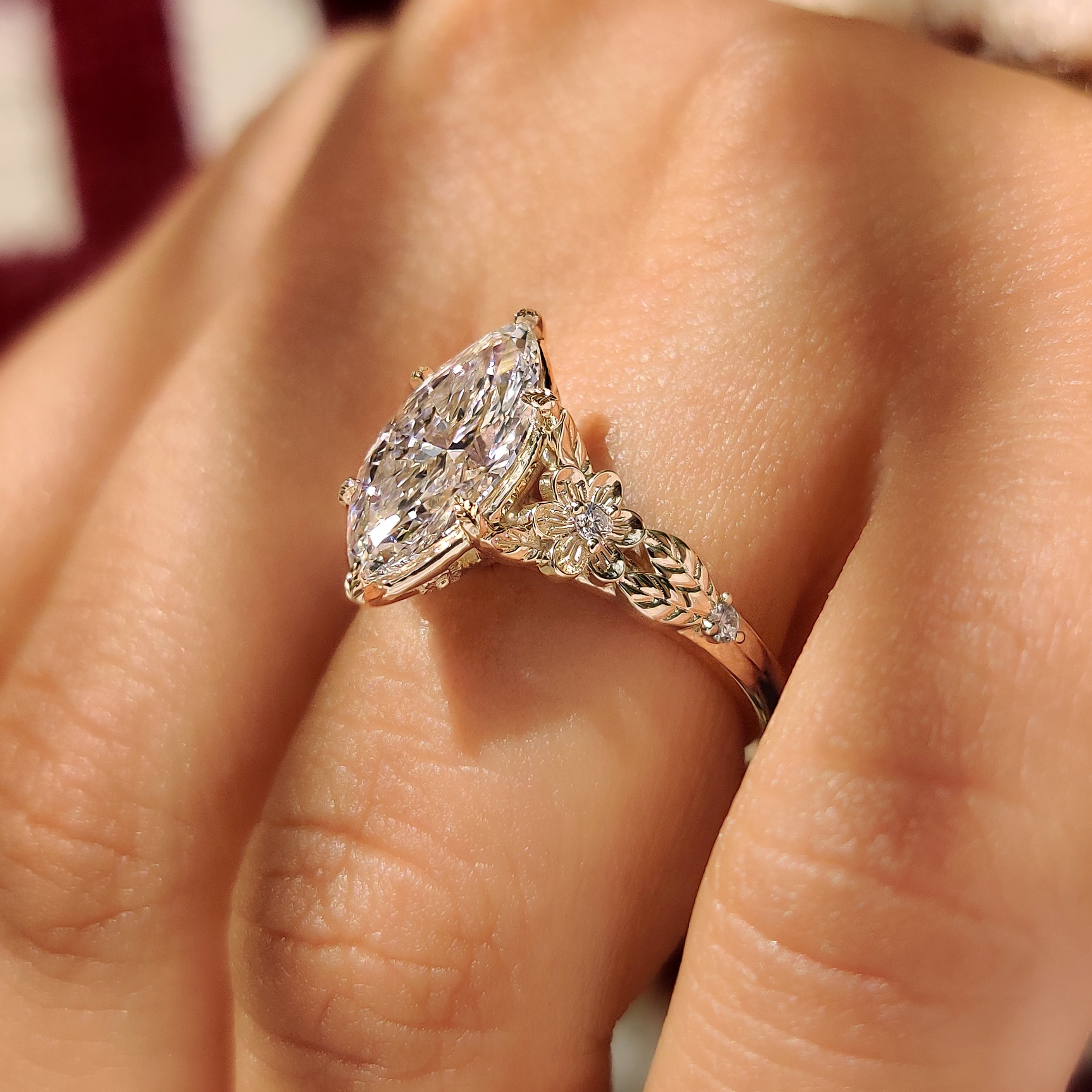 Lab grown marquise diamond ring with floral inspired details
