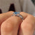 Blue Dutch marquise center diamond in a nature inspired style.
