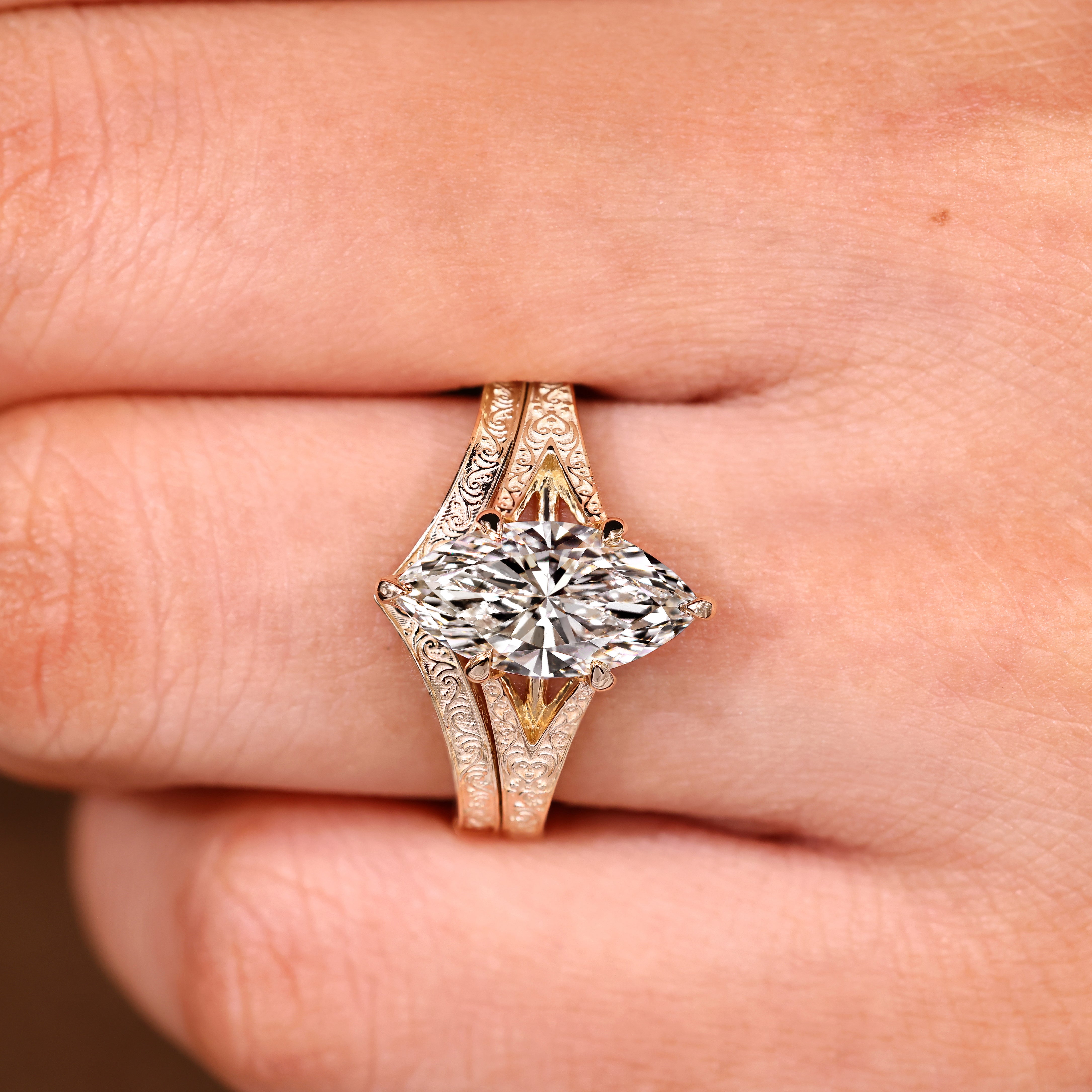 Vintage solitaire marquise ring paired with a matching contour wedding band
