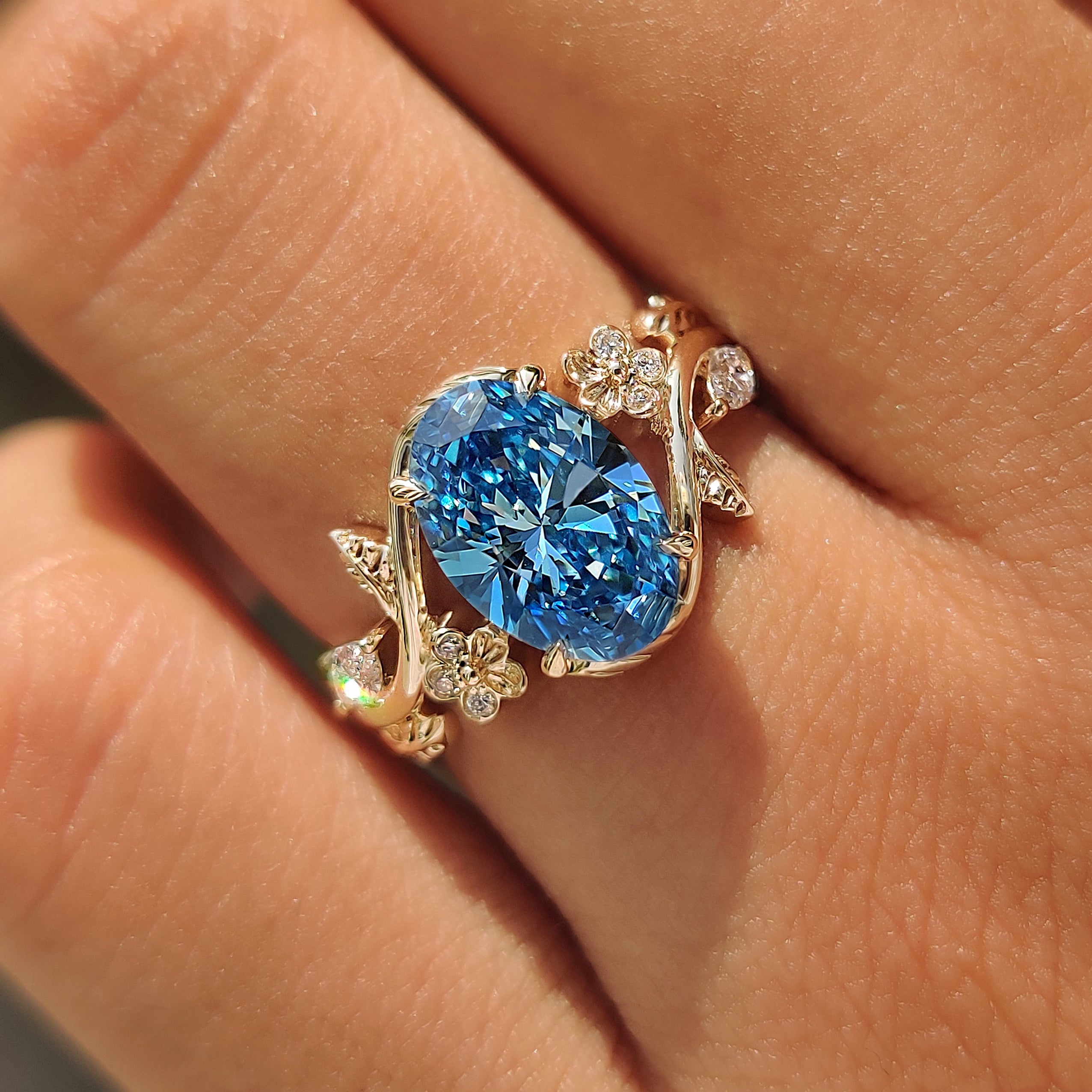 Oak leaf detailing on nature inspired engagement ring.
