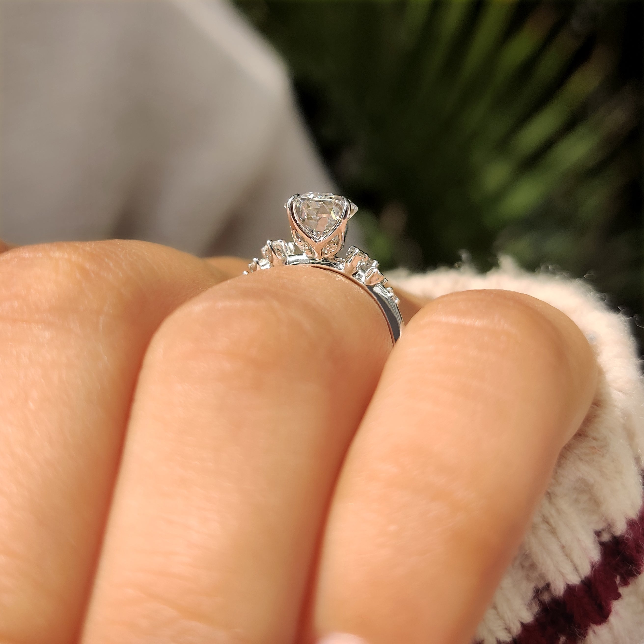 Coffin engagement ring with tulip basket and claw prongs
