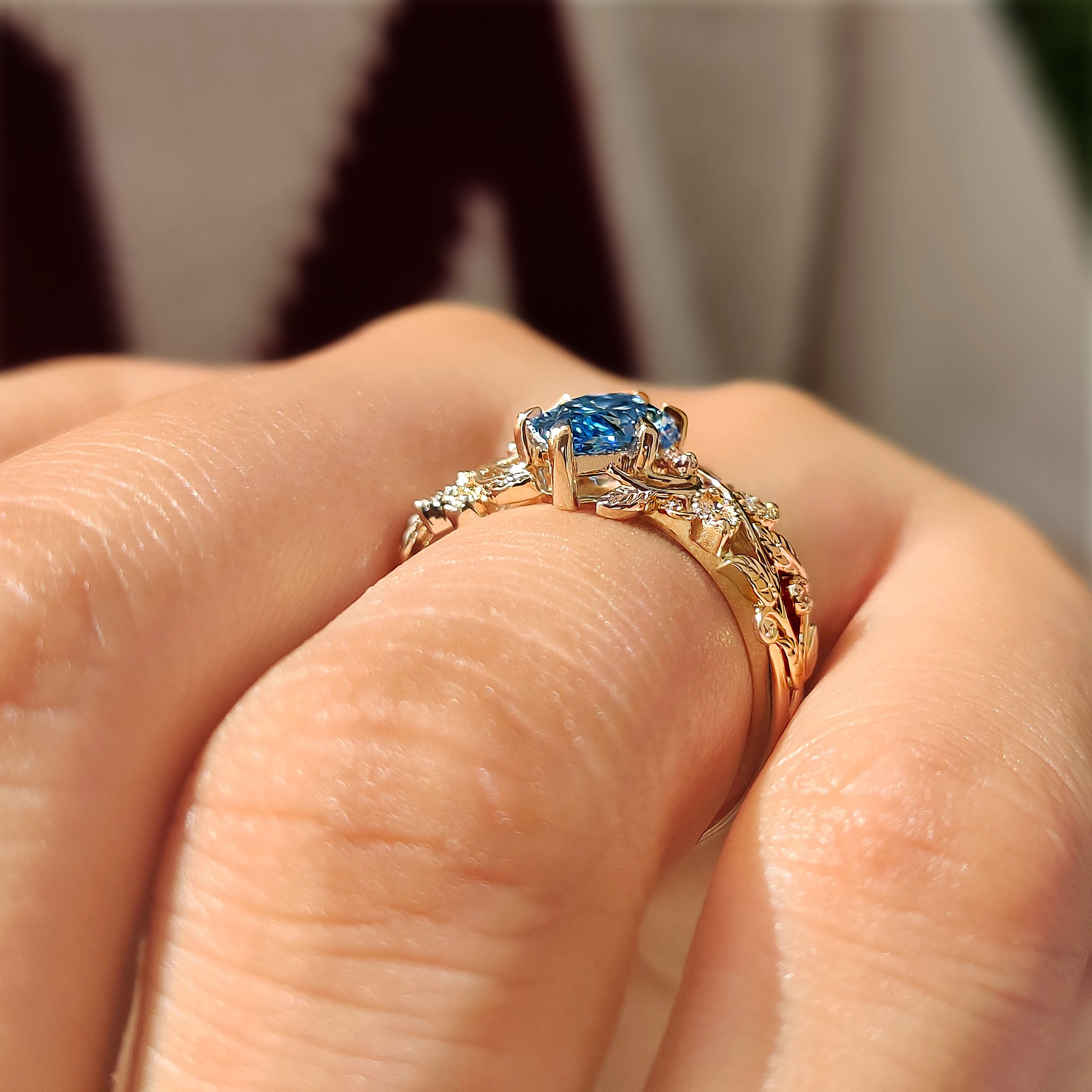 Marquise and round side stones with Dutch marquise center
