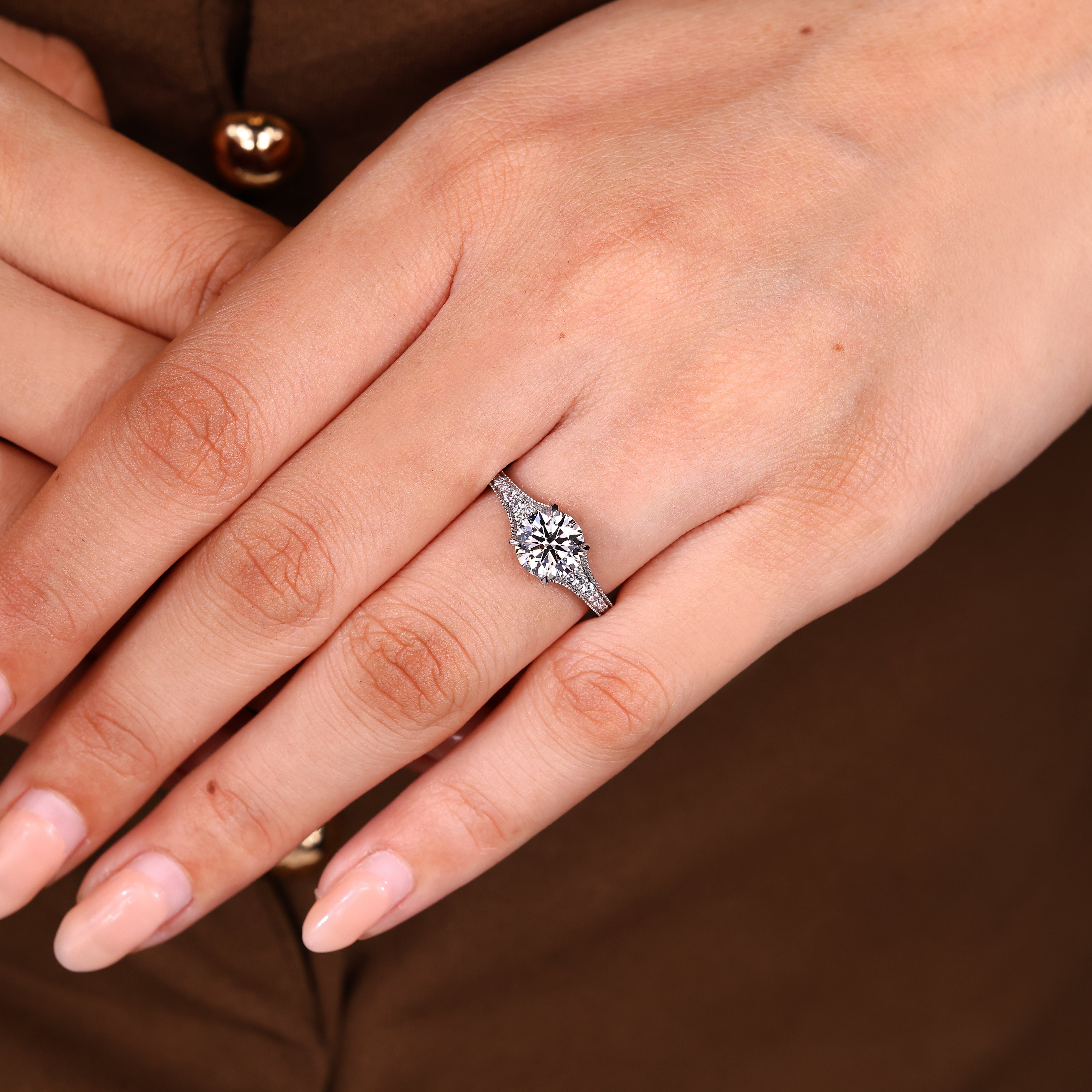 Round lab grown diamond ring with four claw prong setting
