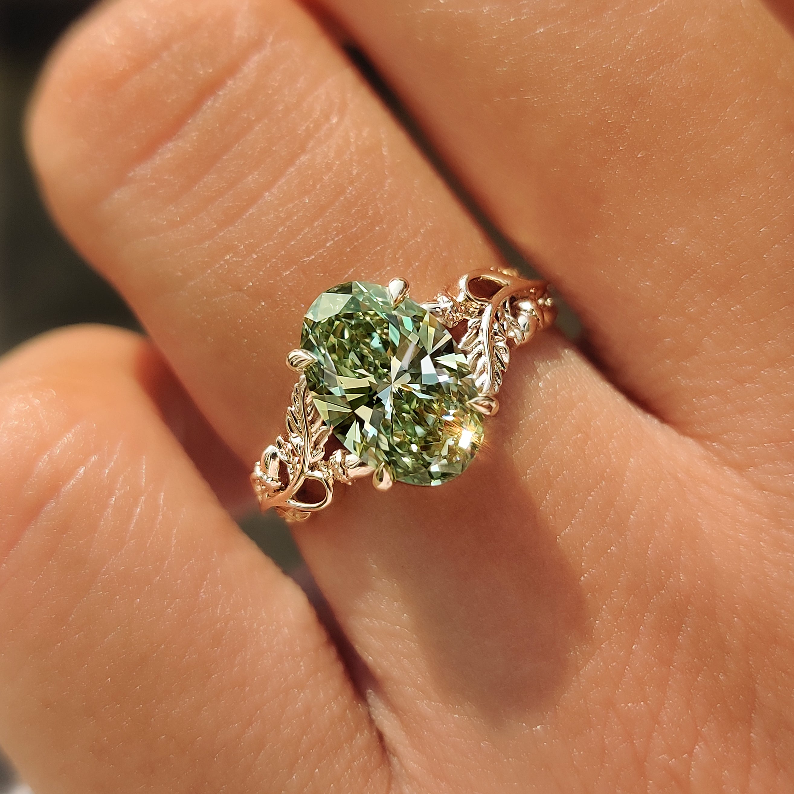 IGI certified 2.00 carat green oval lab grown diamond ring.

