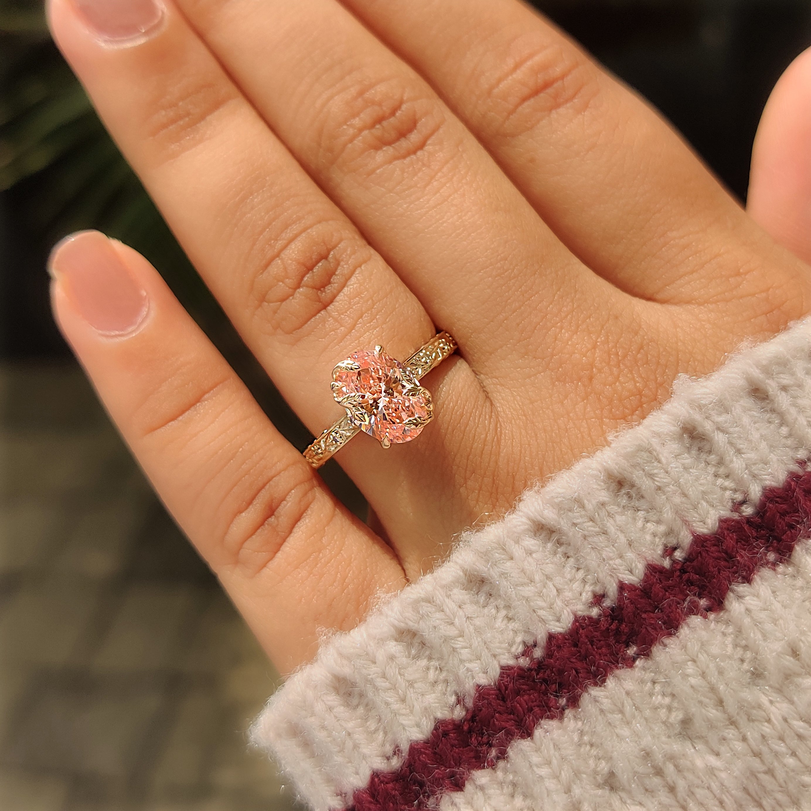 Tulip cathedral setting pink oval diamond ring.

