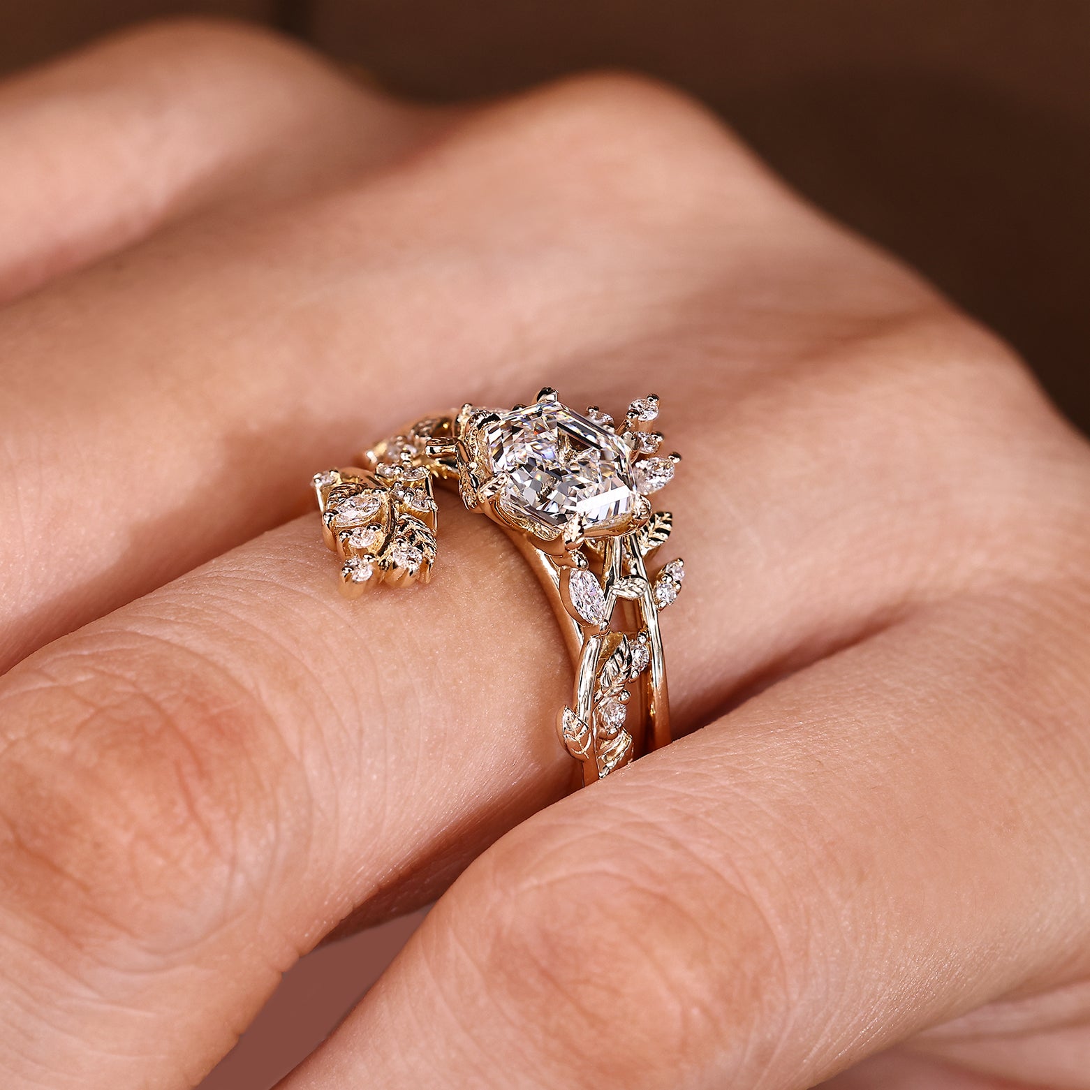 Hexagon engagement ring with marquise and round side stones

