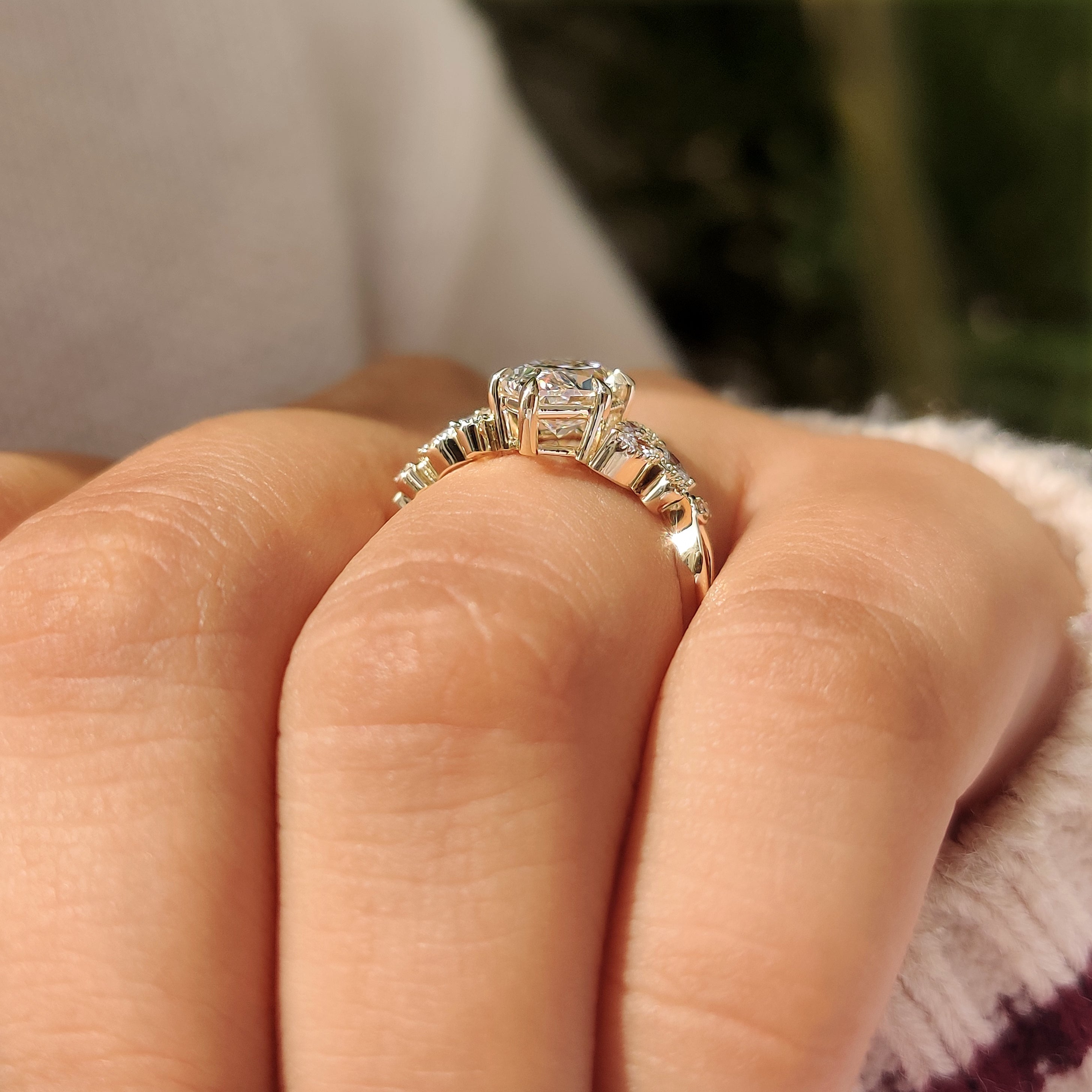 Leaf and vine shank with floral details on dutch marquise ring
