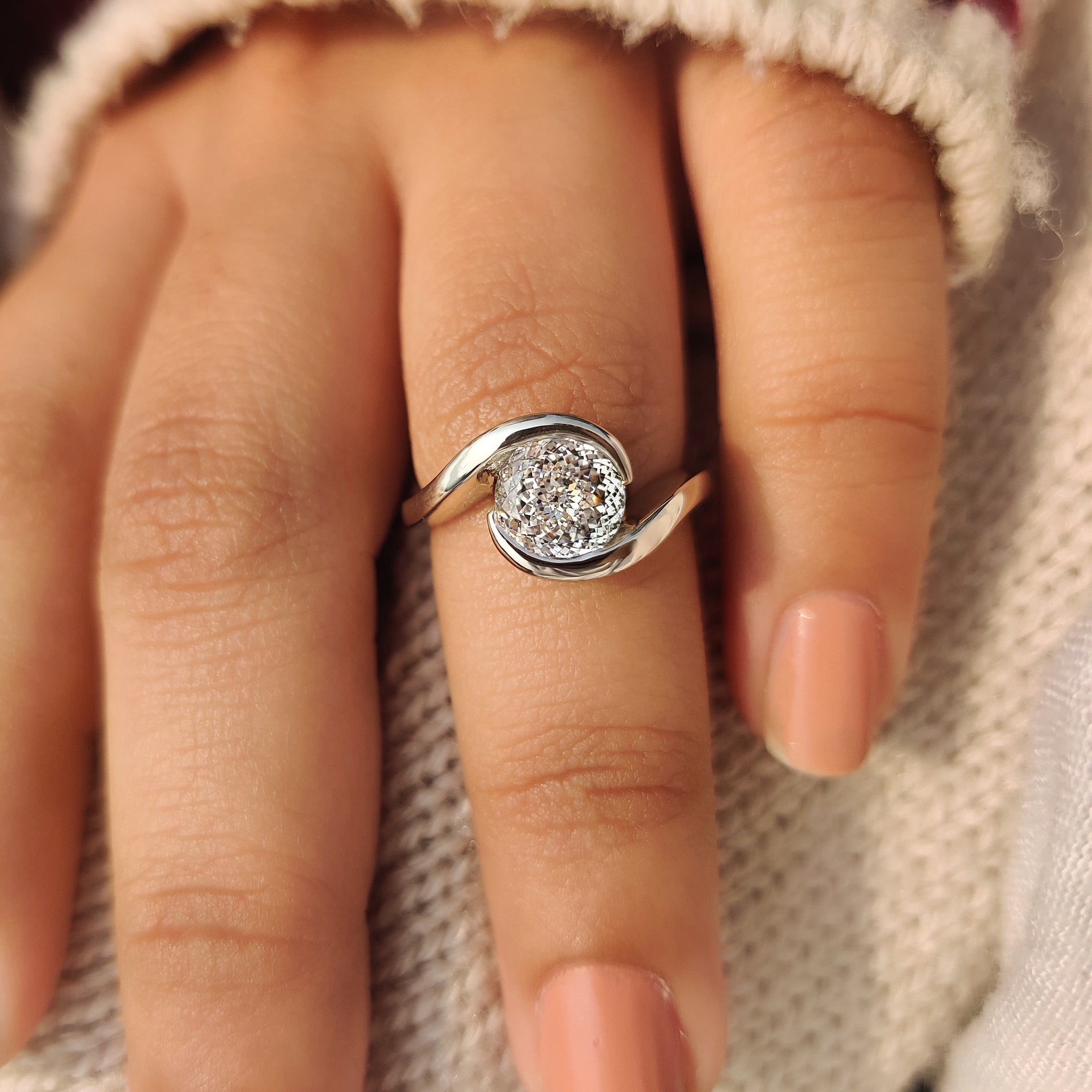 Handmade Portuguese cut ring with half bezel diamond setting.
