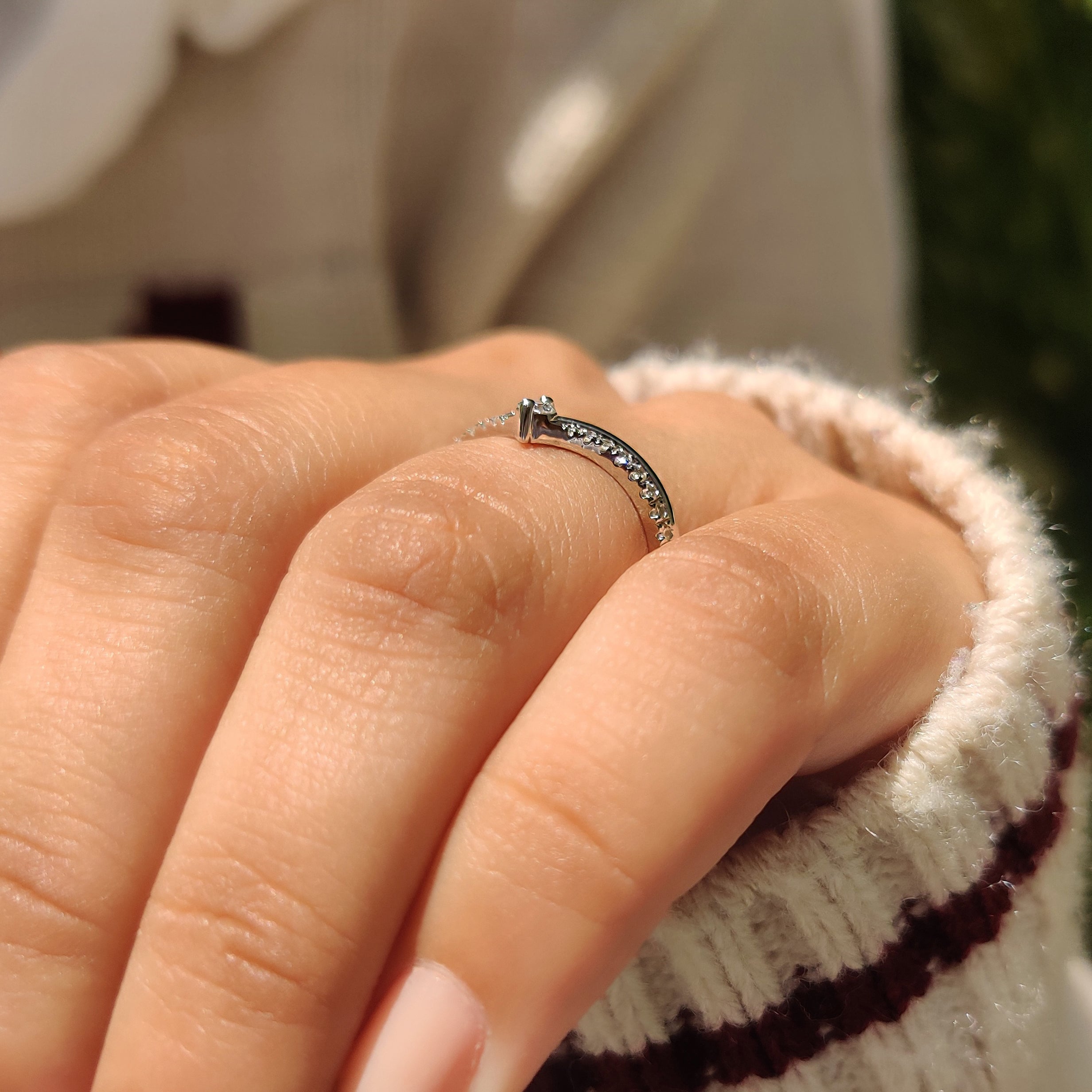 Round lab diamond wedding band with chevron design details

