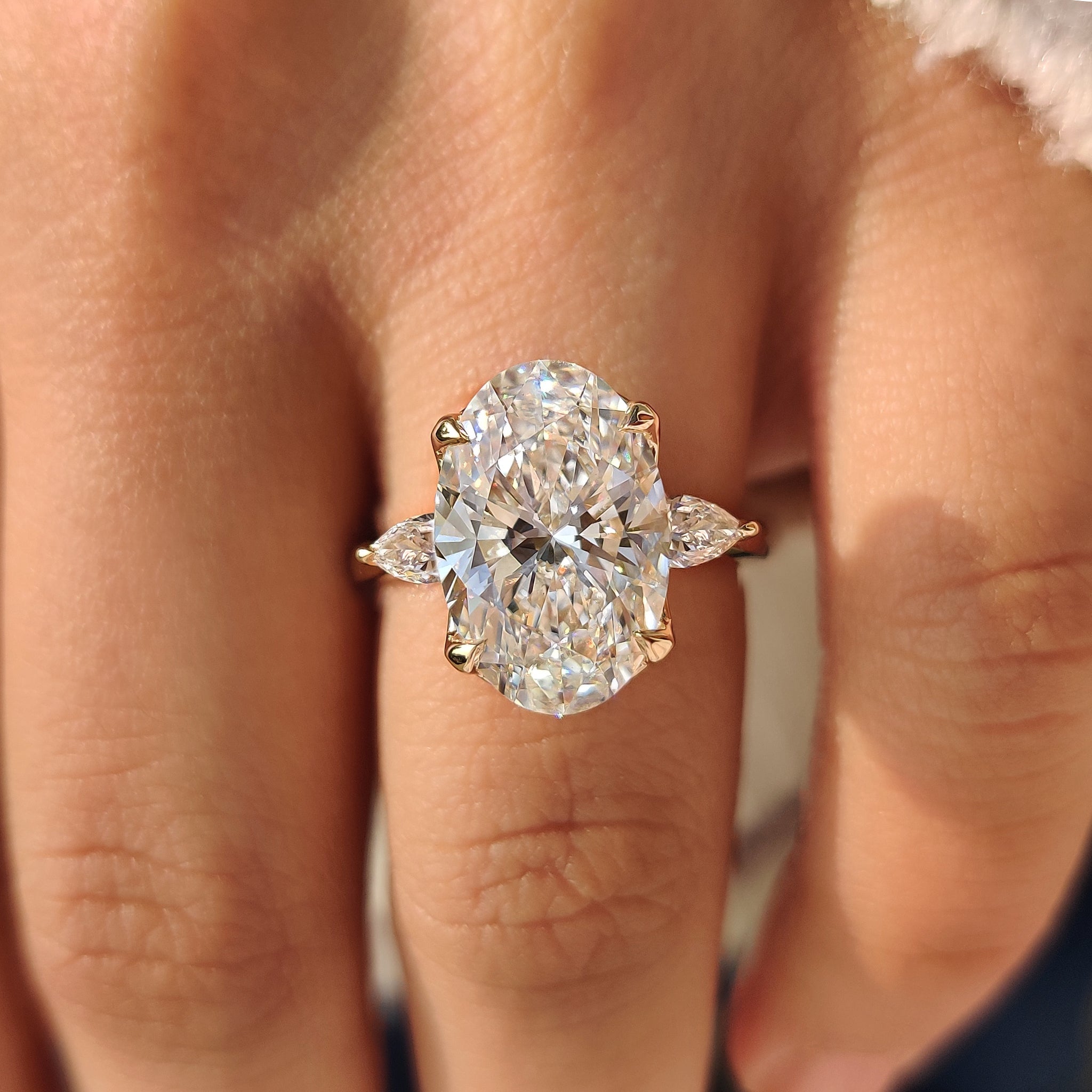 Handmade three stone diamond ring with claw prong setting
