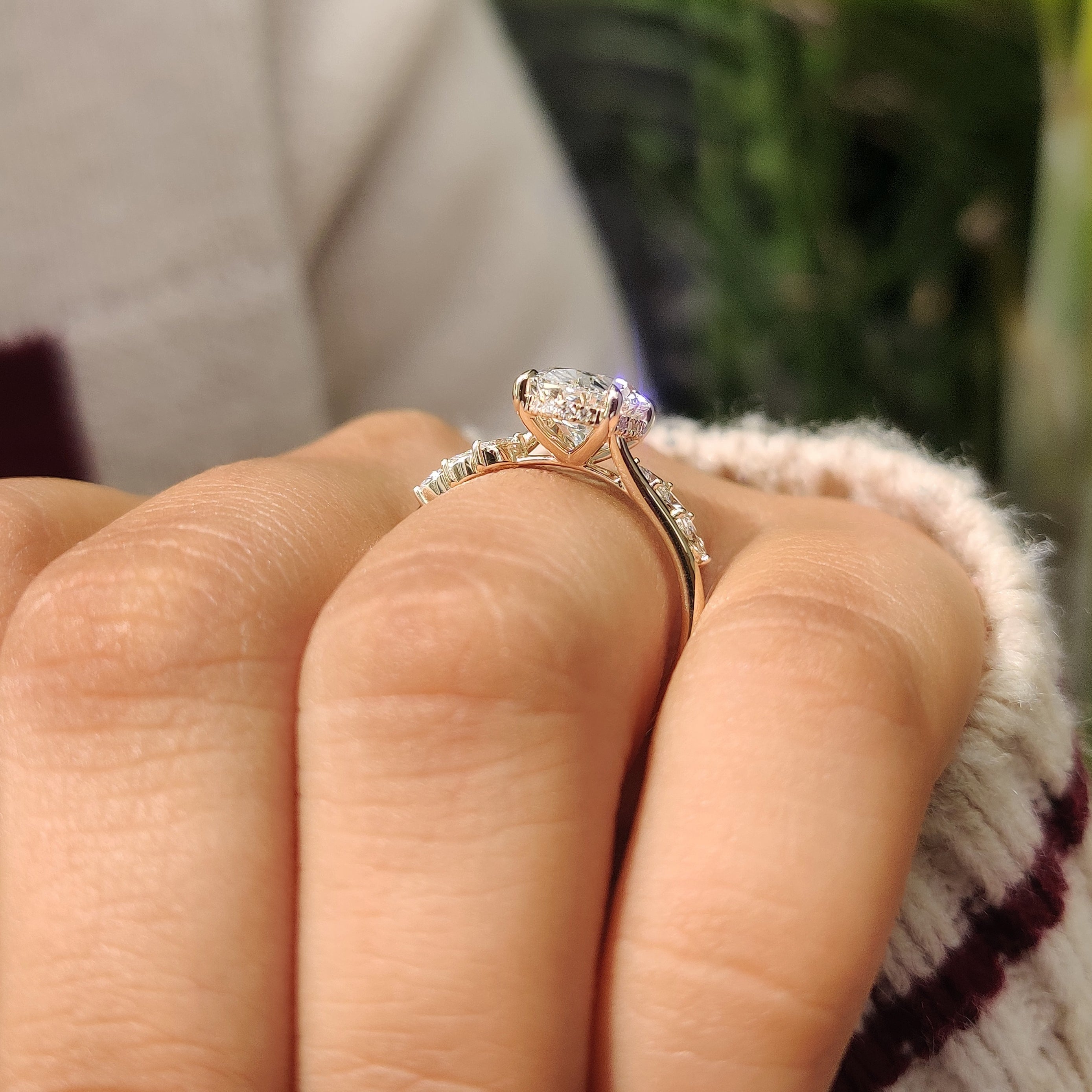 Handmade oval diamond ring with hidden halo.
