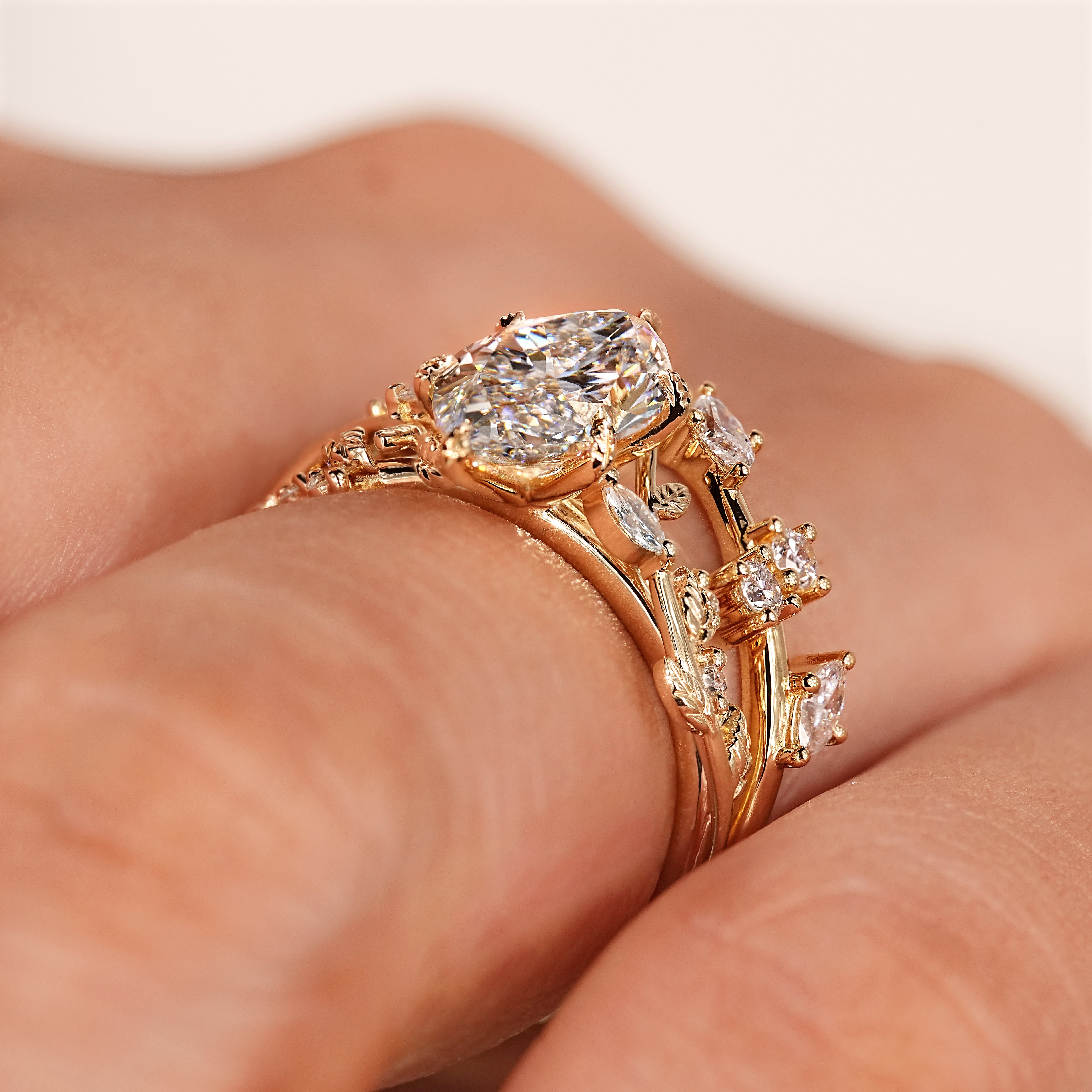 Bridal set featuring an elongated marquise center diamond.
