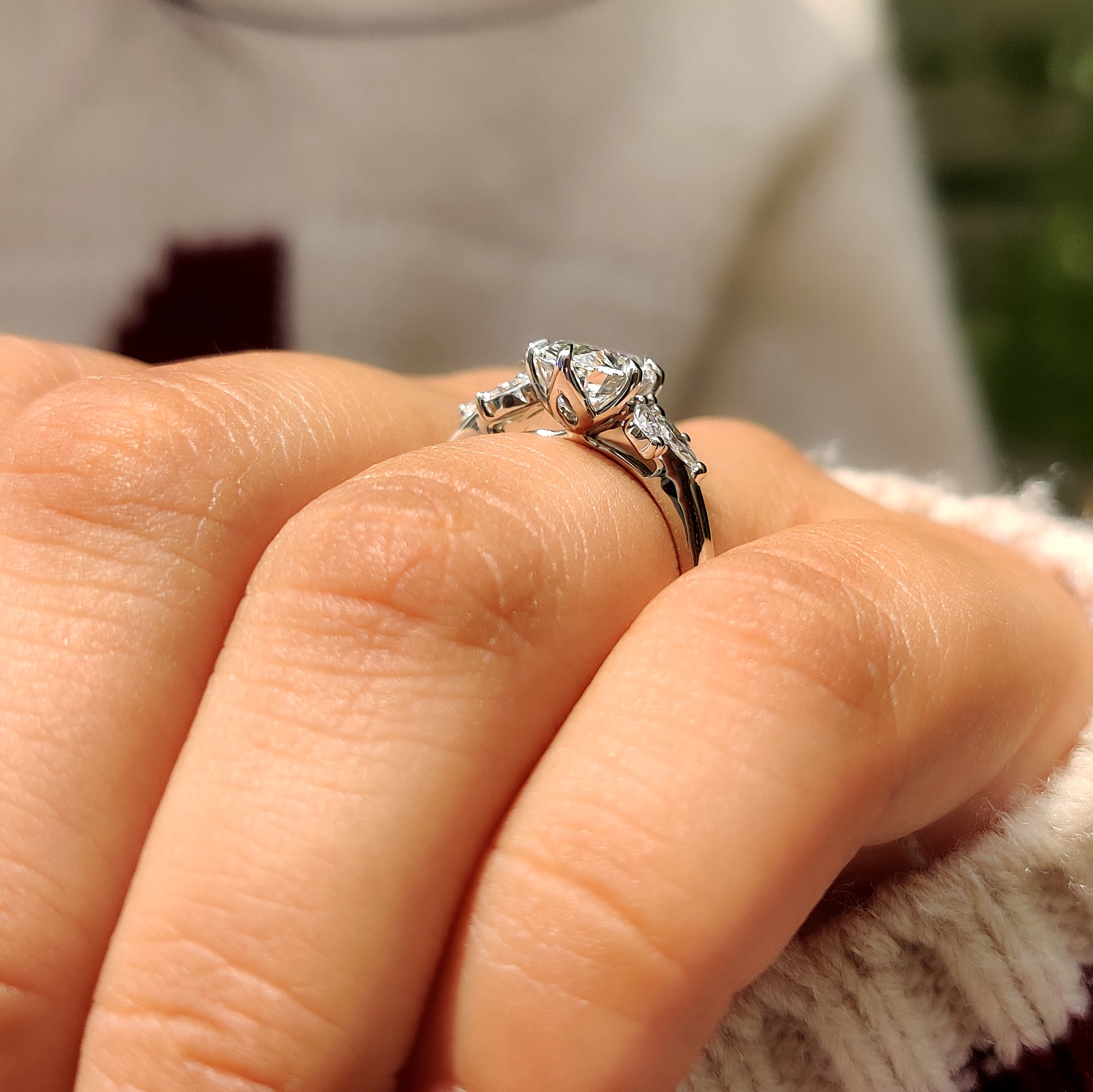 Seven stone oval diamond ring with tulip style setting
