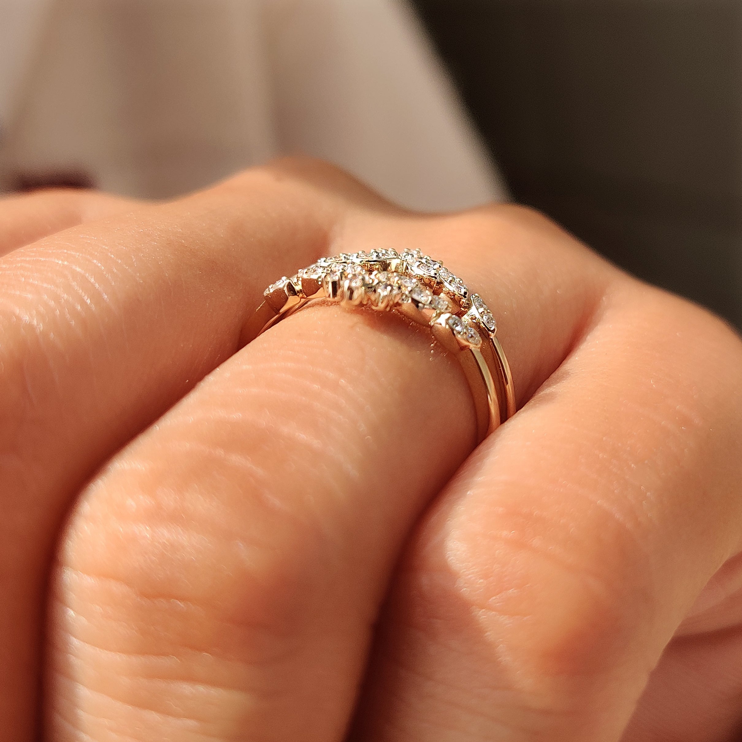Handmade round diamond wedding band by Carat Diamonds.