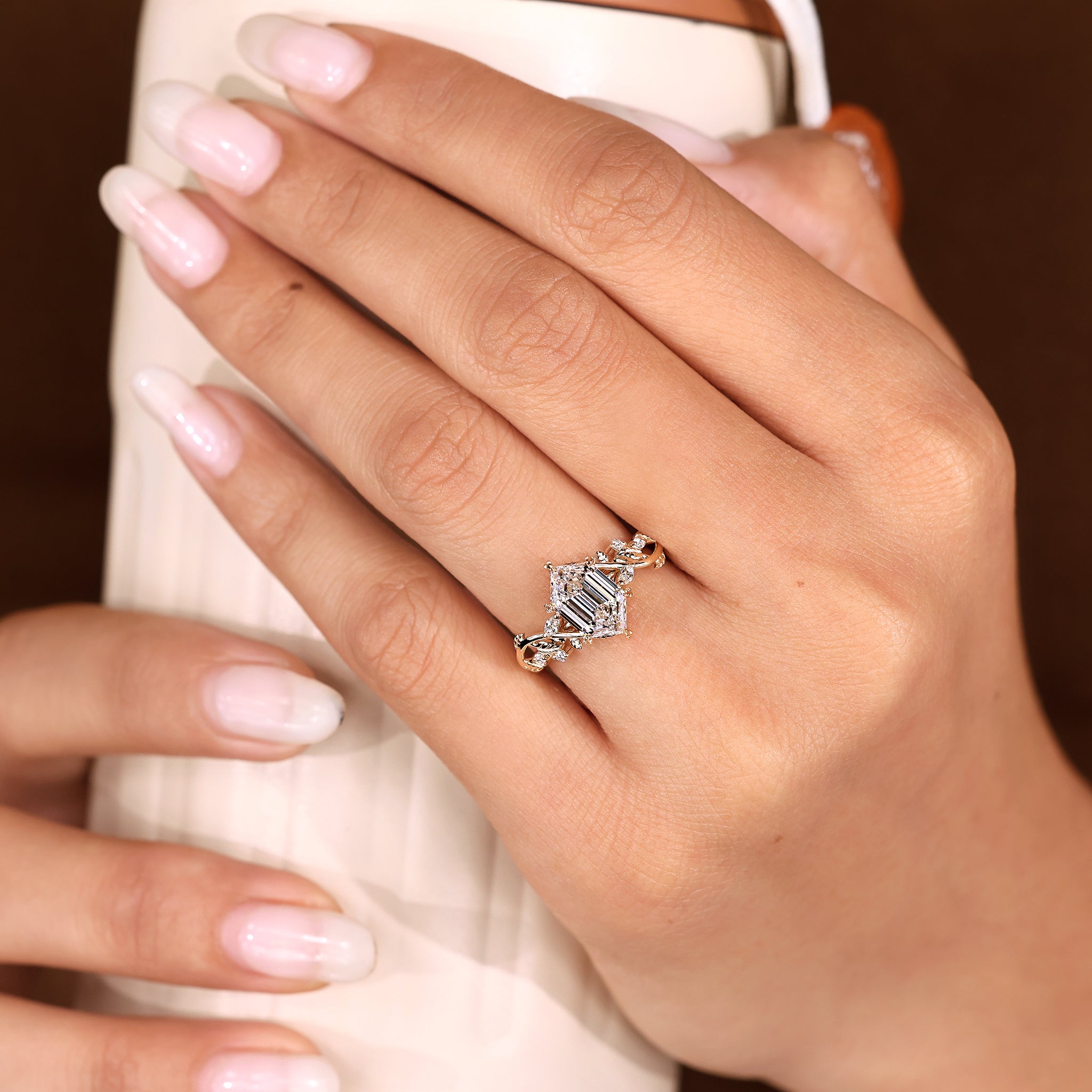 Nature inspired ring featuring leaf and vine band design
