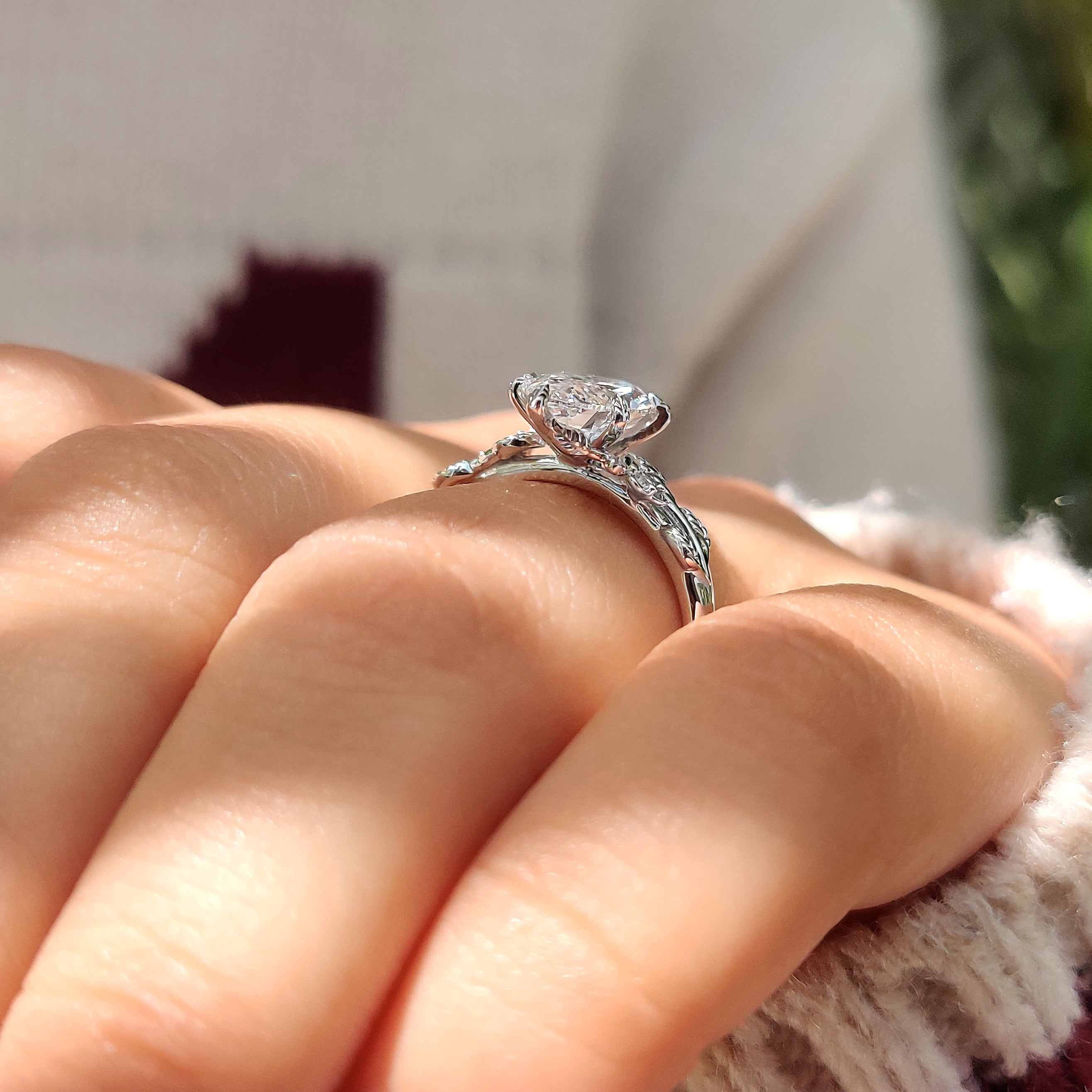 Nature inspired diamond ring with marquise cluster setting design.
