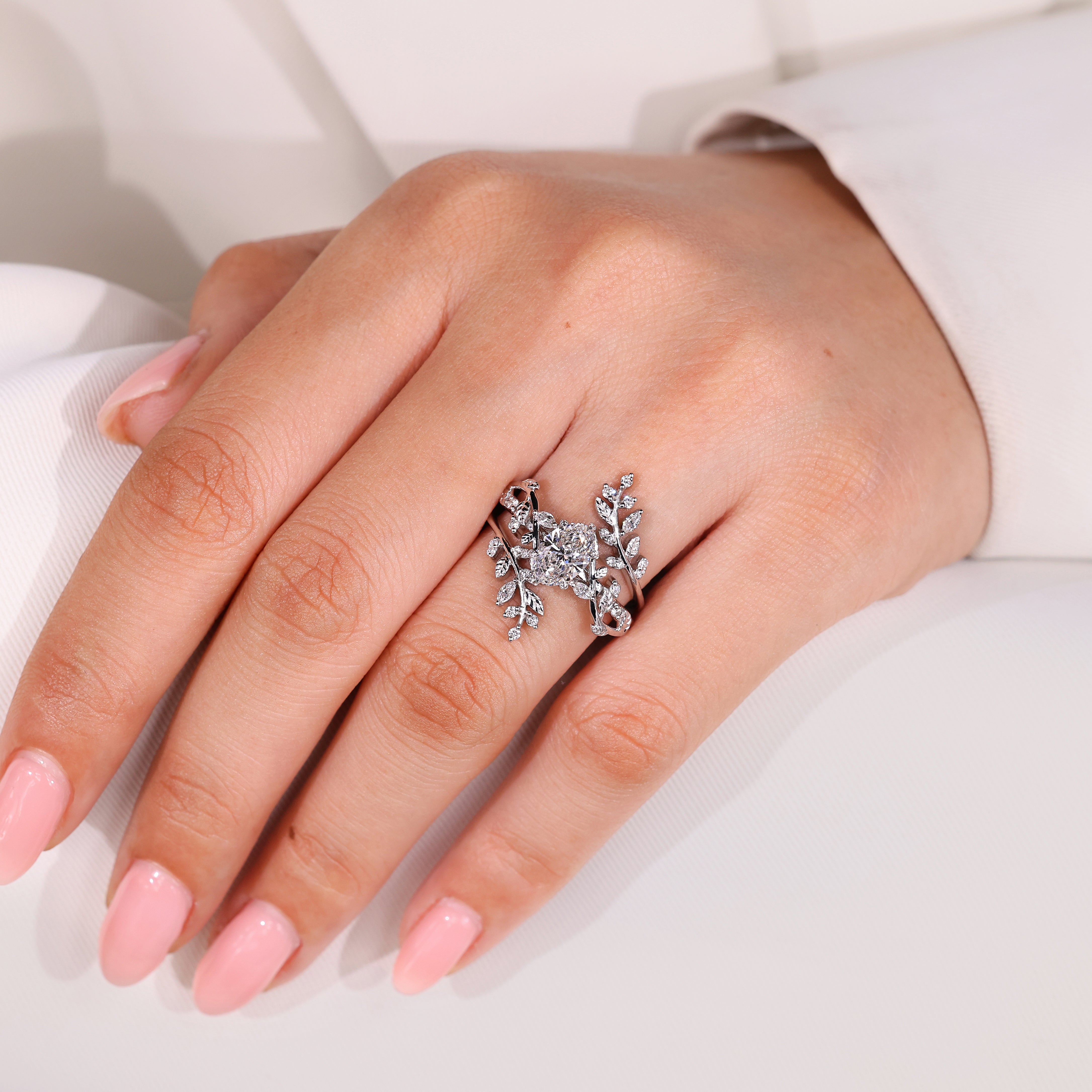 Oval Engagement Ring with Cluster Setting
