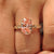 Vintage inspired pink oval diamond ring with filigree.
