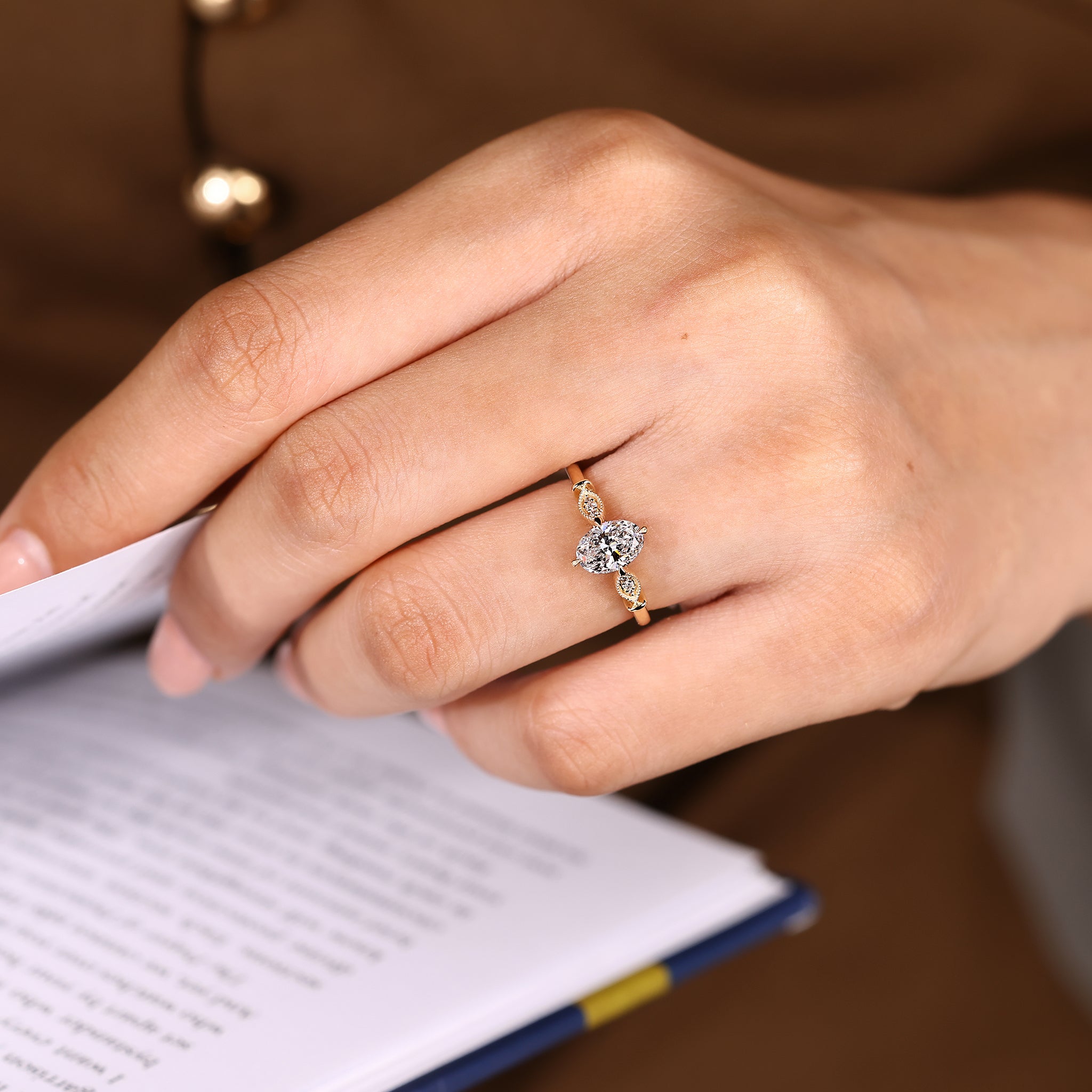 Vintage oval diamond ring with compass claw prong setting
