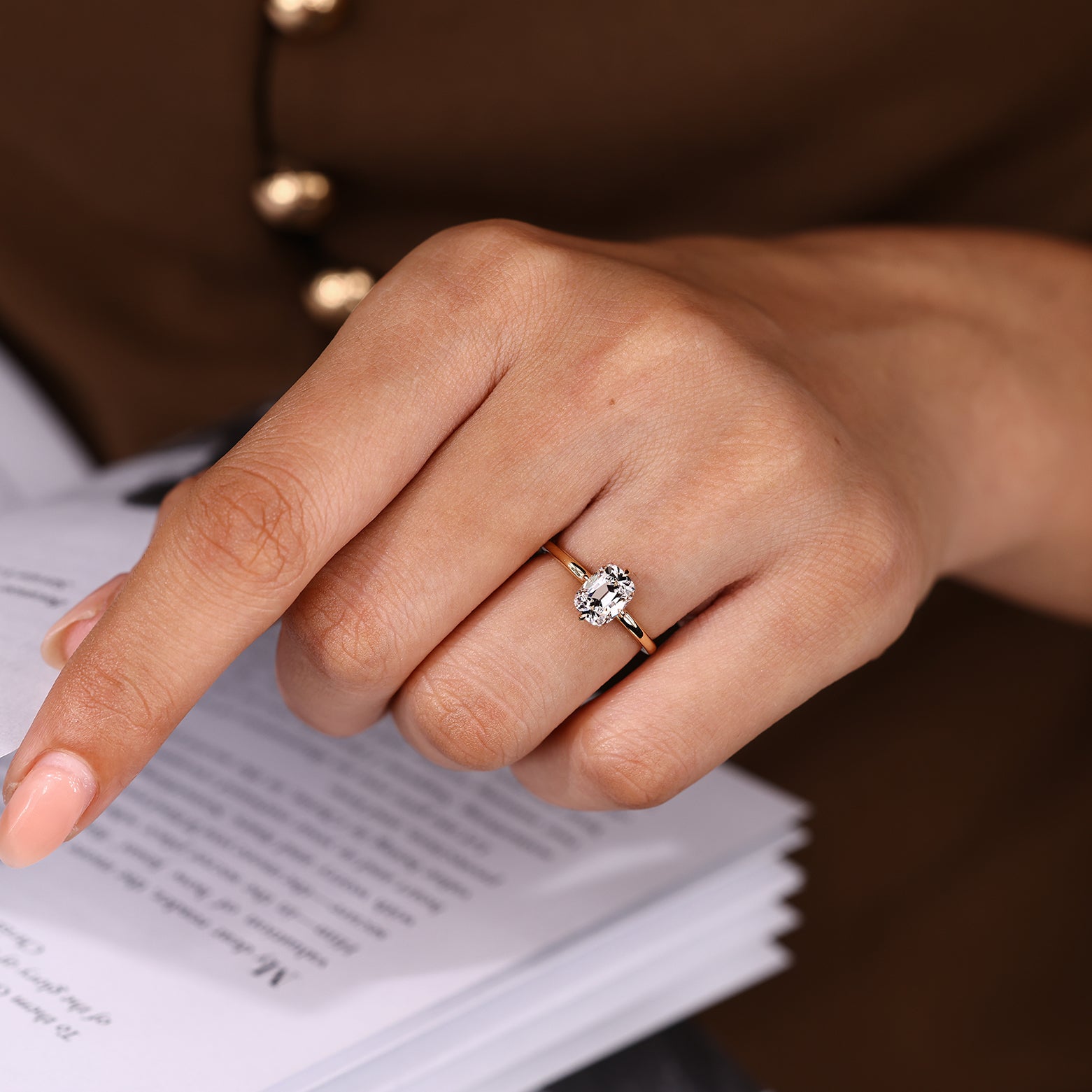 Compass claw prong cushion diamond ring with hidden halo
