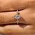 Handmade lozenge cut ring with kite side accent stones
