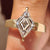 Lozenge cut lab grown diamond ring with tapered shank
