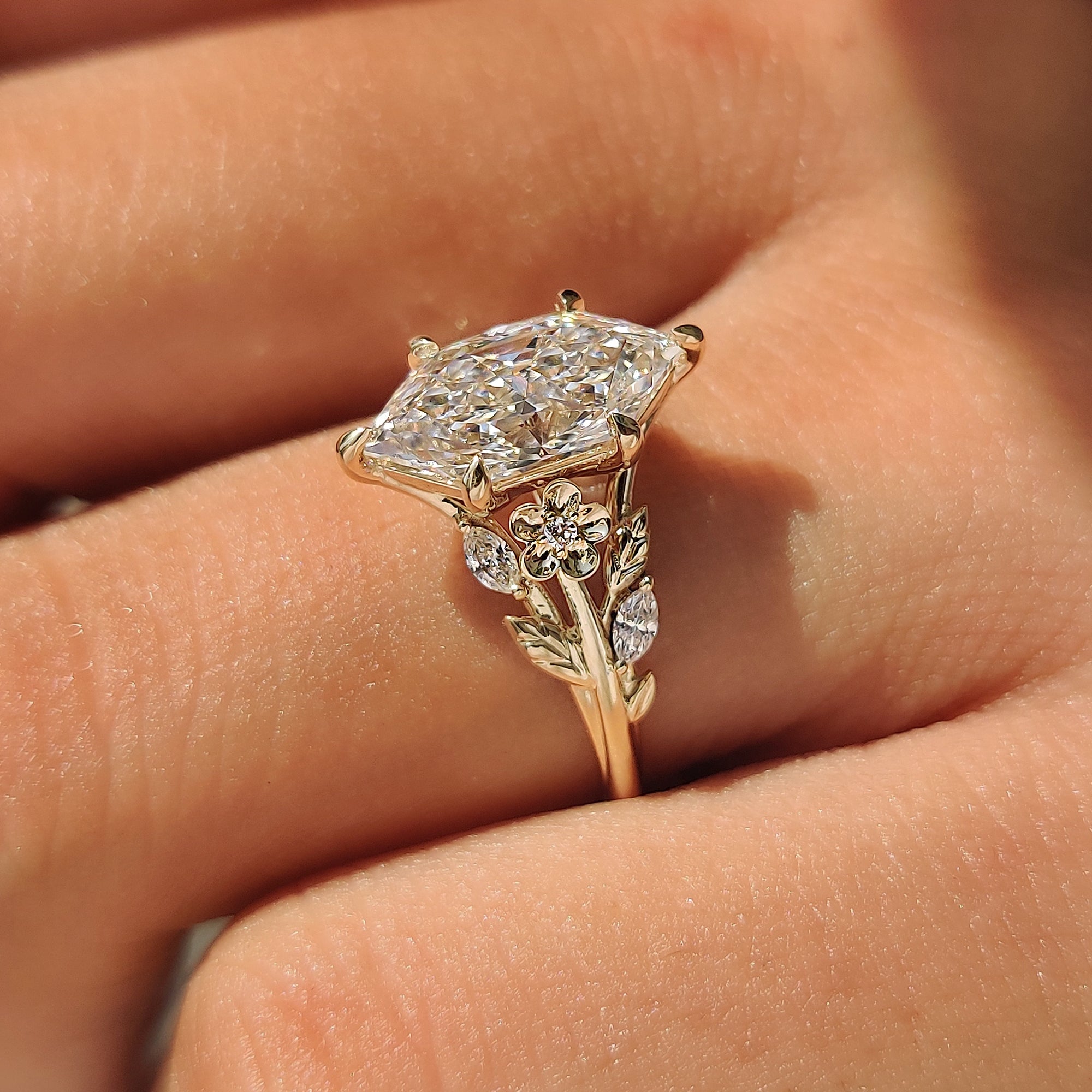 Cathedral profile on a Dutch marquise engagement ring.
