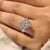 IGI certified marquise diamond ring with cluster setting style.
