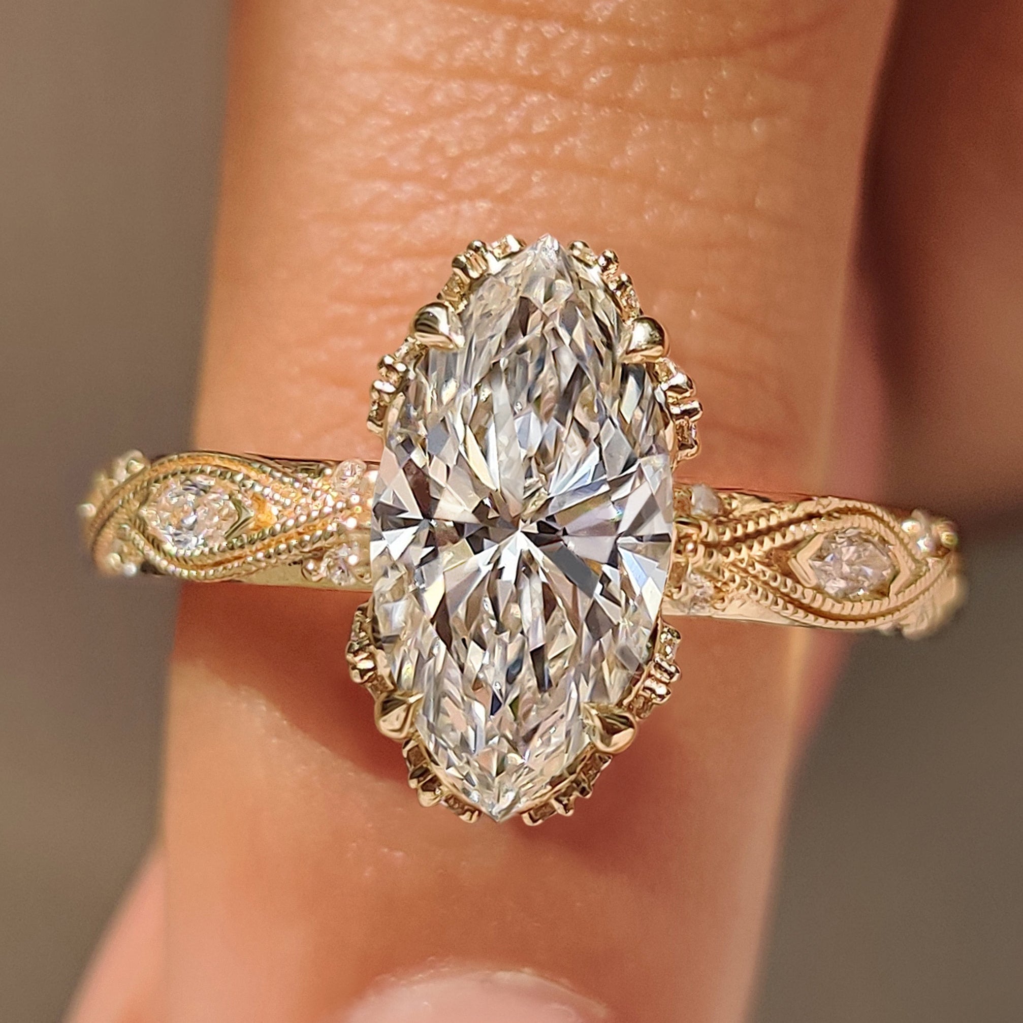 Marquise cut diamond ring with vintage milgrain details.
