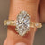 Marquise cut diamond ring with vintage milgrain details.
