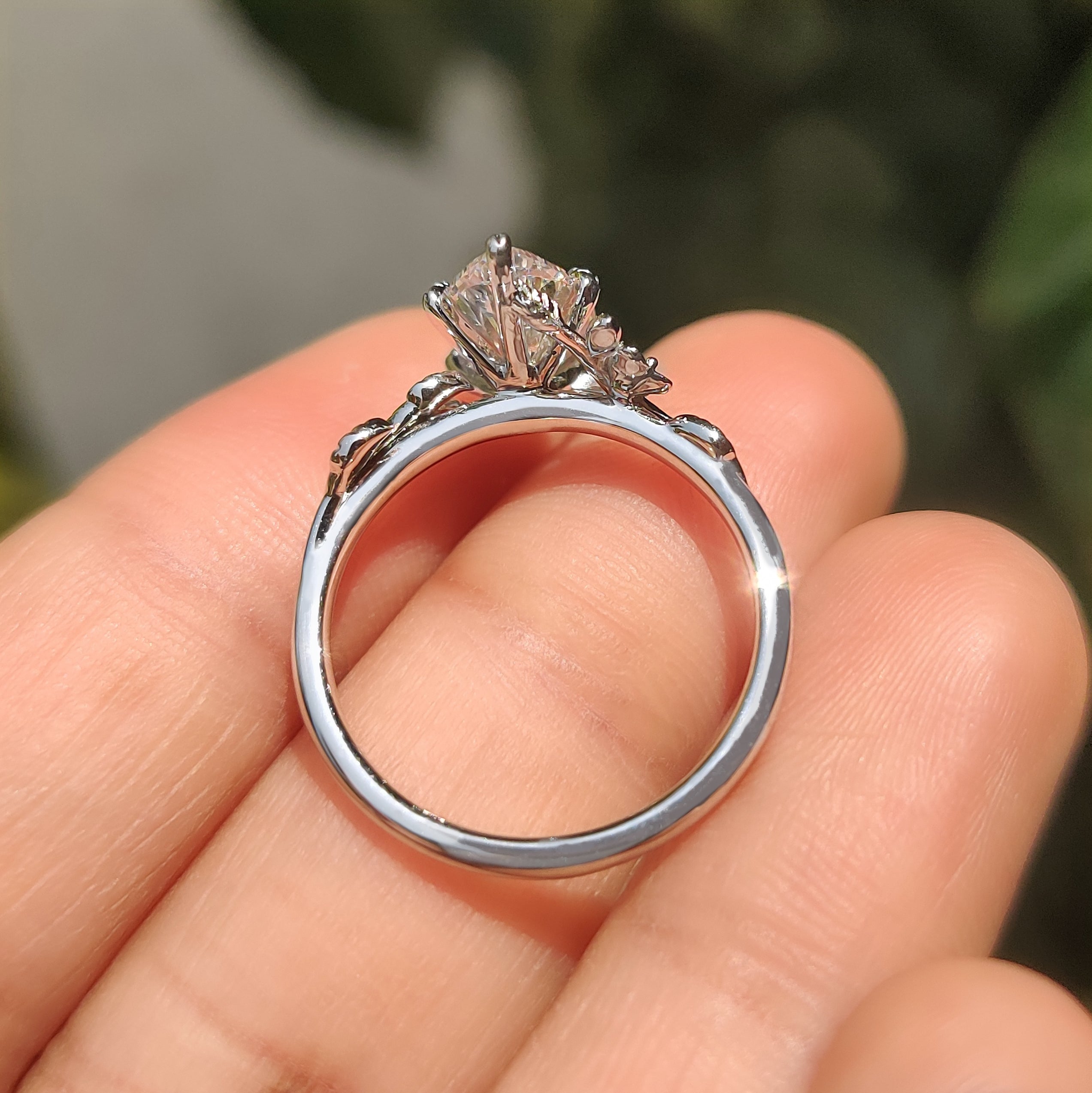 IGI certified marquise ring with six leaf style prongs.
