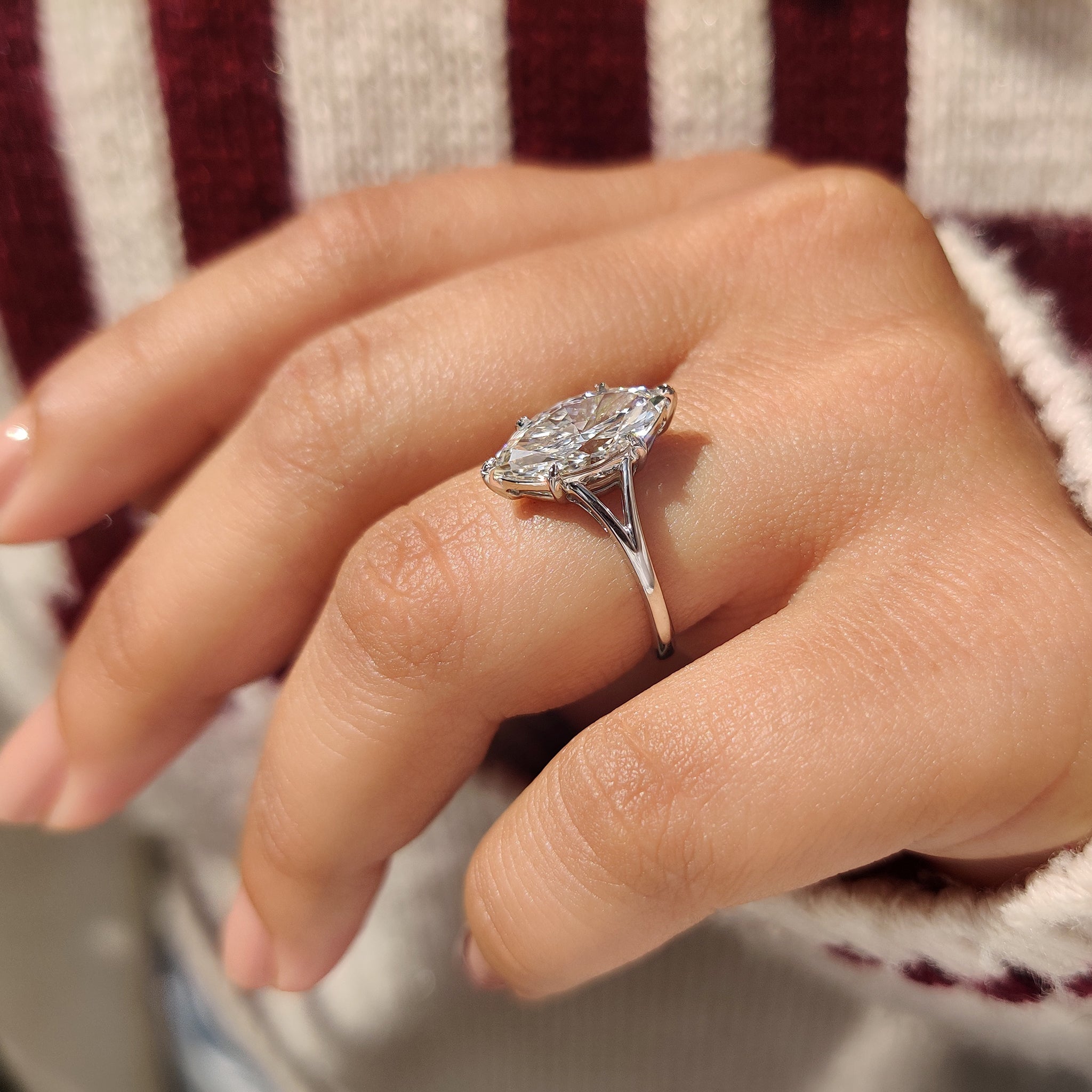Handmade marquise cut solitaire diamond ring IGI certified.
