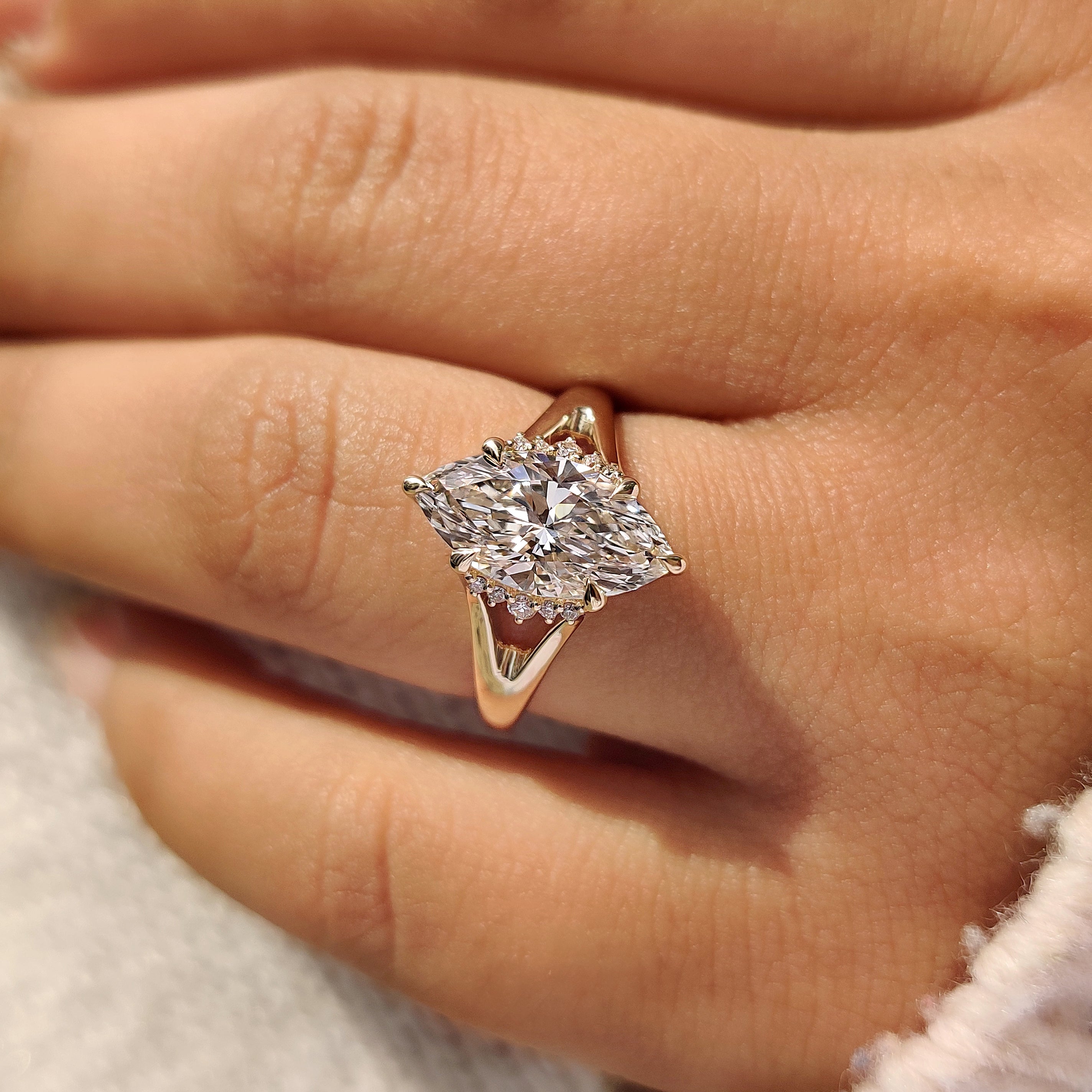 Handmade marquise diamond ring with six claw prong setting
