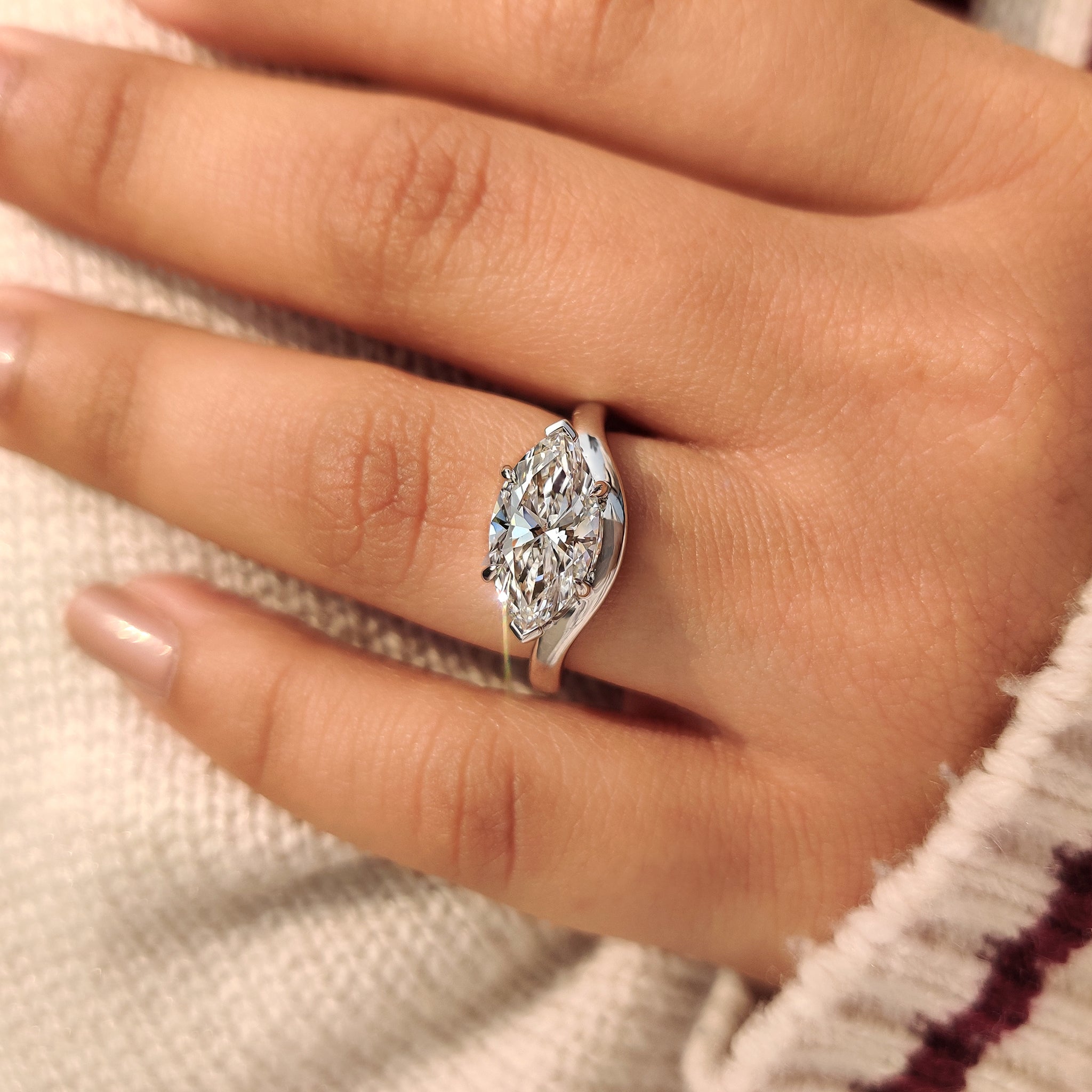 Handmade marquise diamond engagement ring with secure prongs
