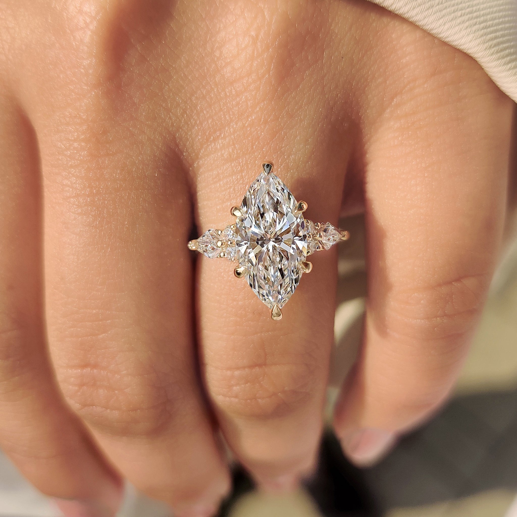 Marquise ring with six claw prong setting style.
