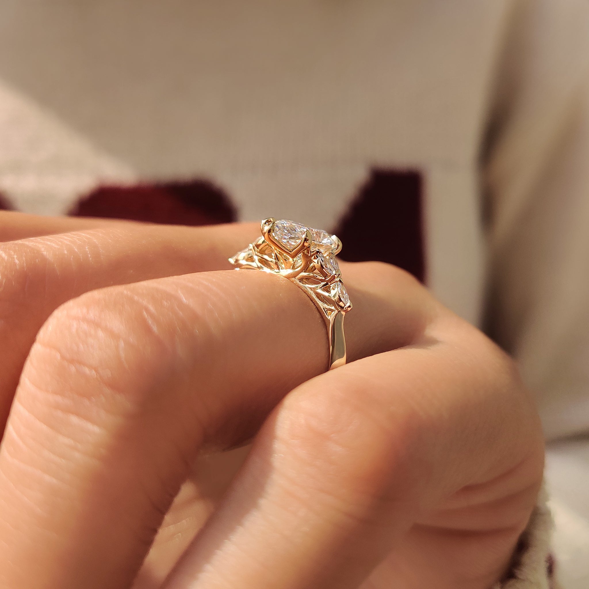 Marquise diamond ring with marquise side stone accents
