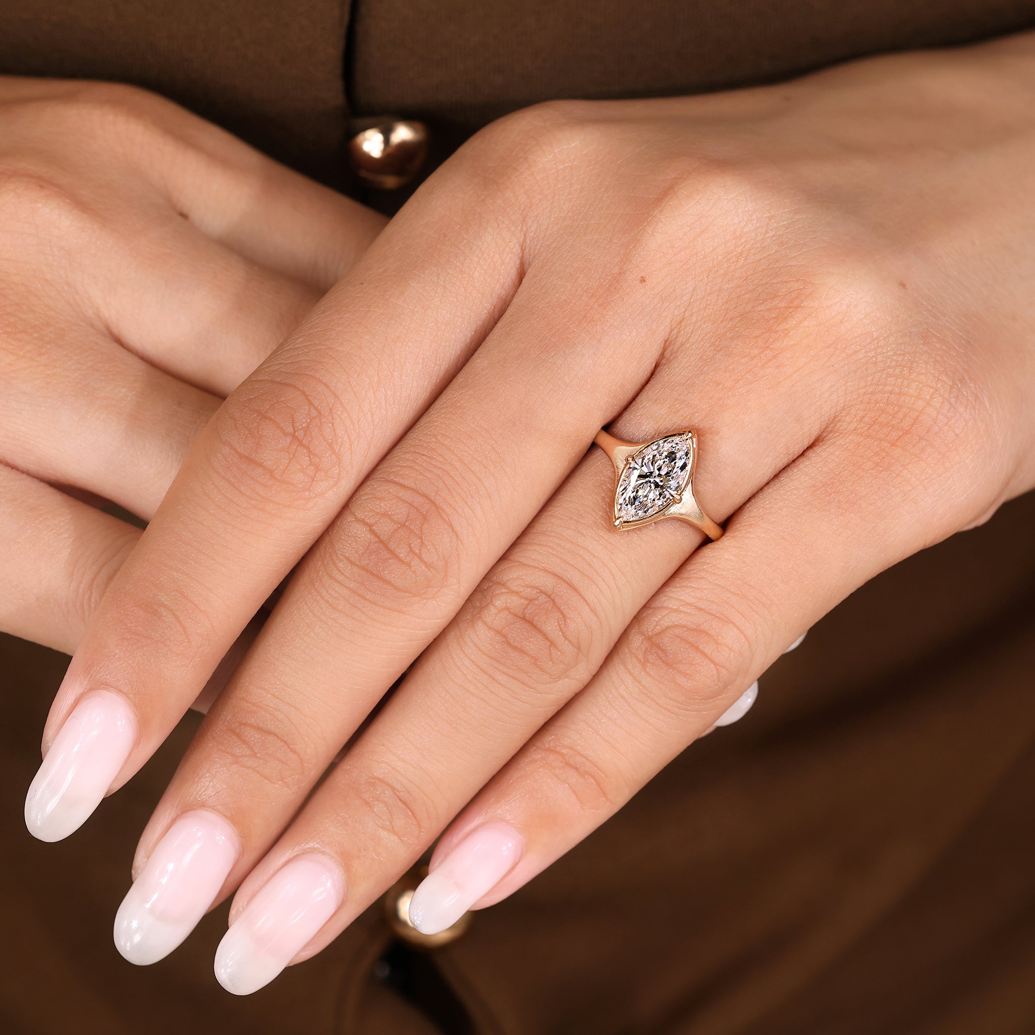 Lab grown marquise diamond engagement ring handmade by artisans.
