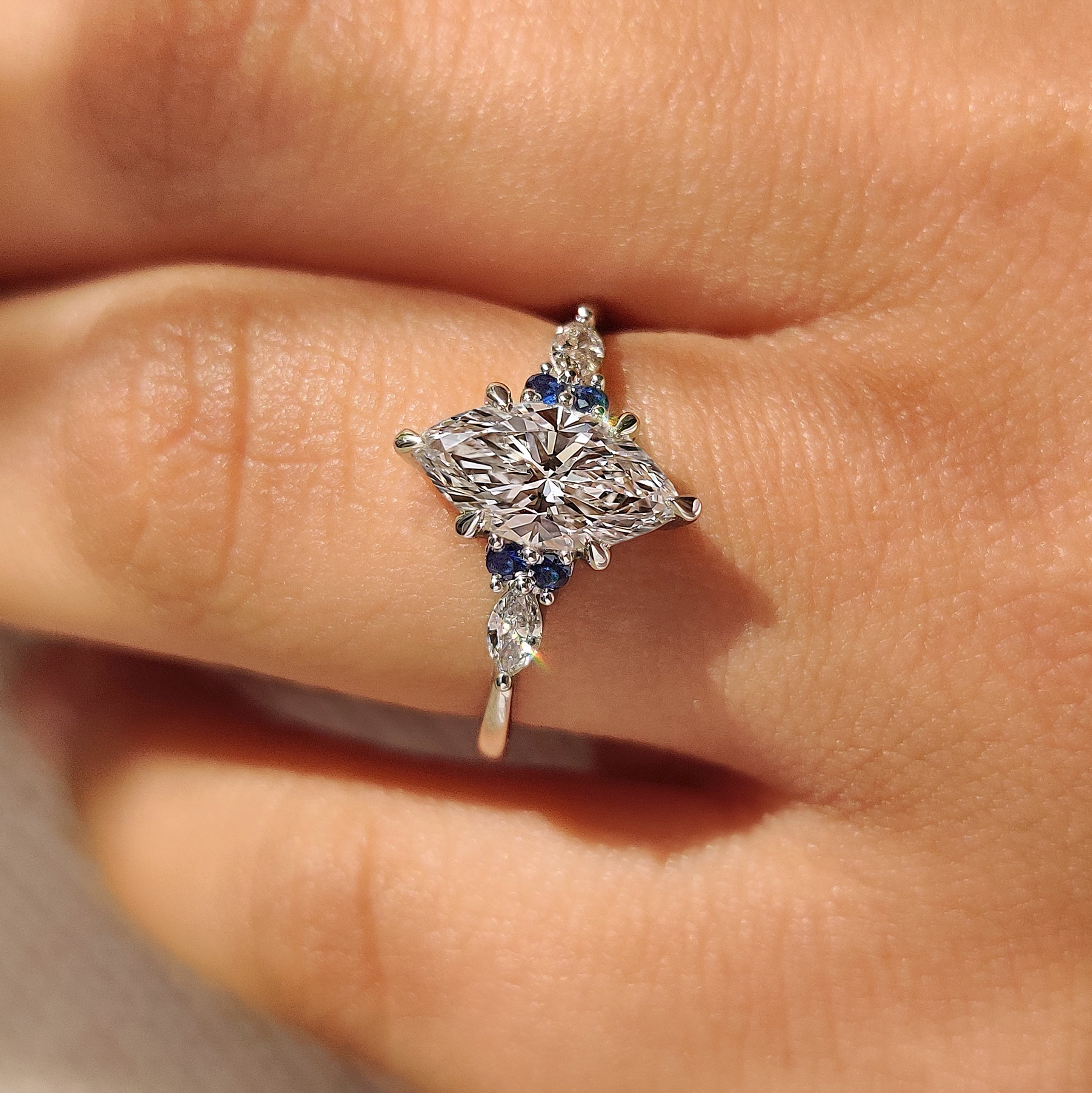 Lab grown marquise diamond ring with tapered shank design
