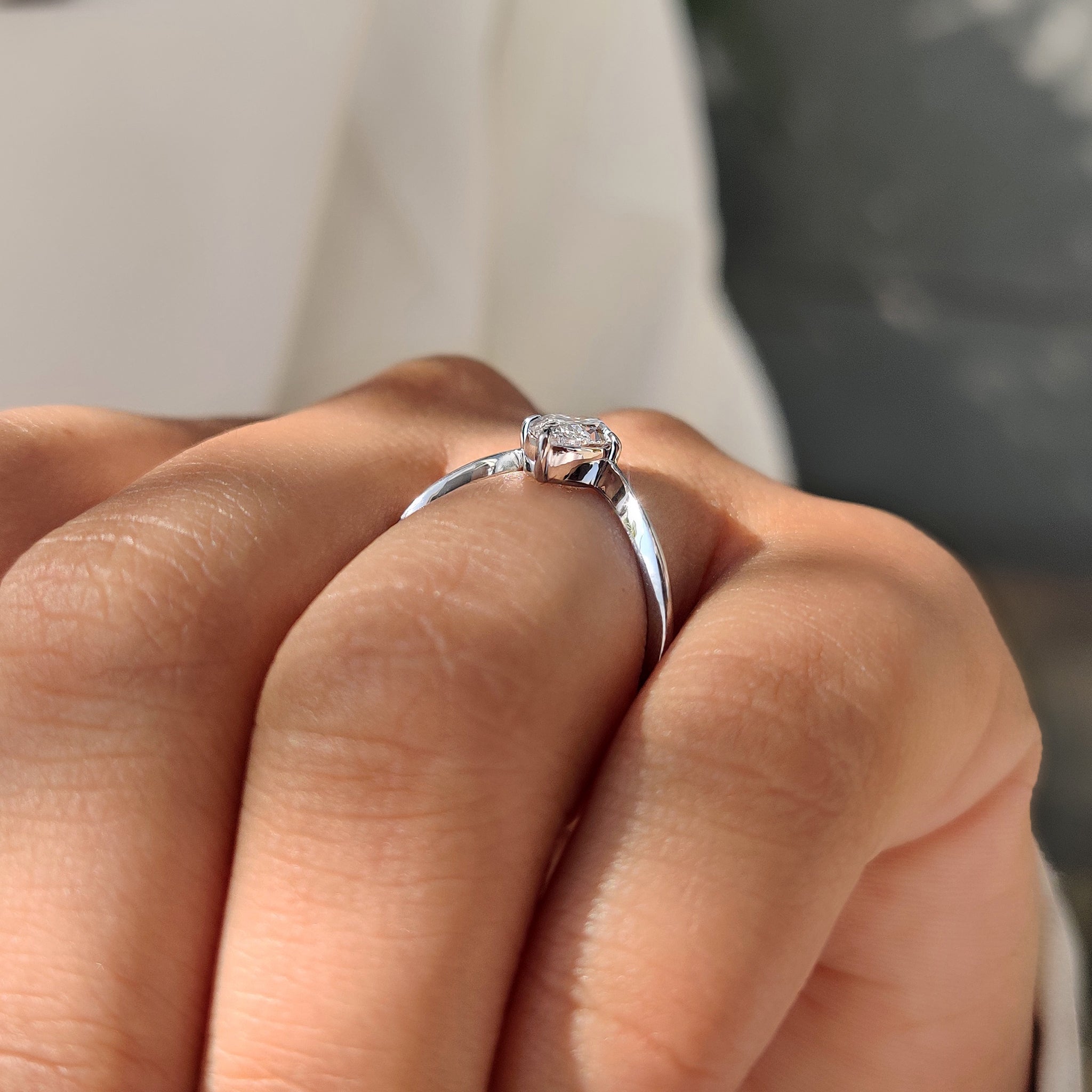 Upside down marquise diamond ring with claw prong setting.
