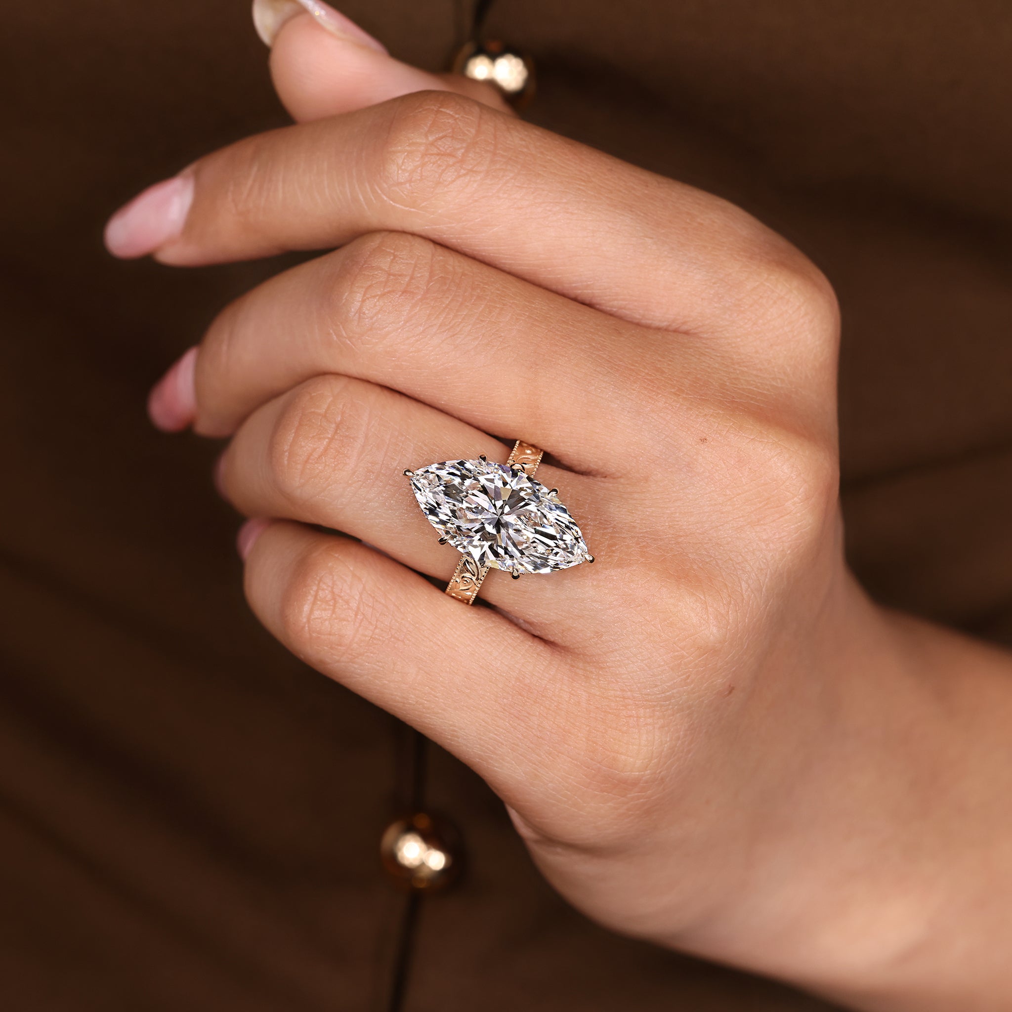 Solitaire Marquise Diamond Ring with hidden halo
