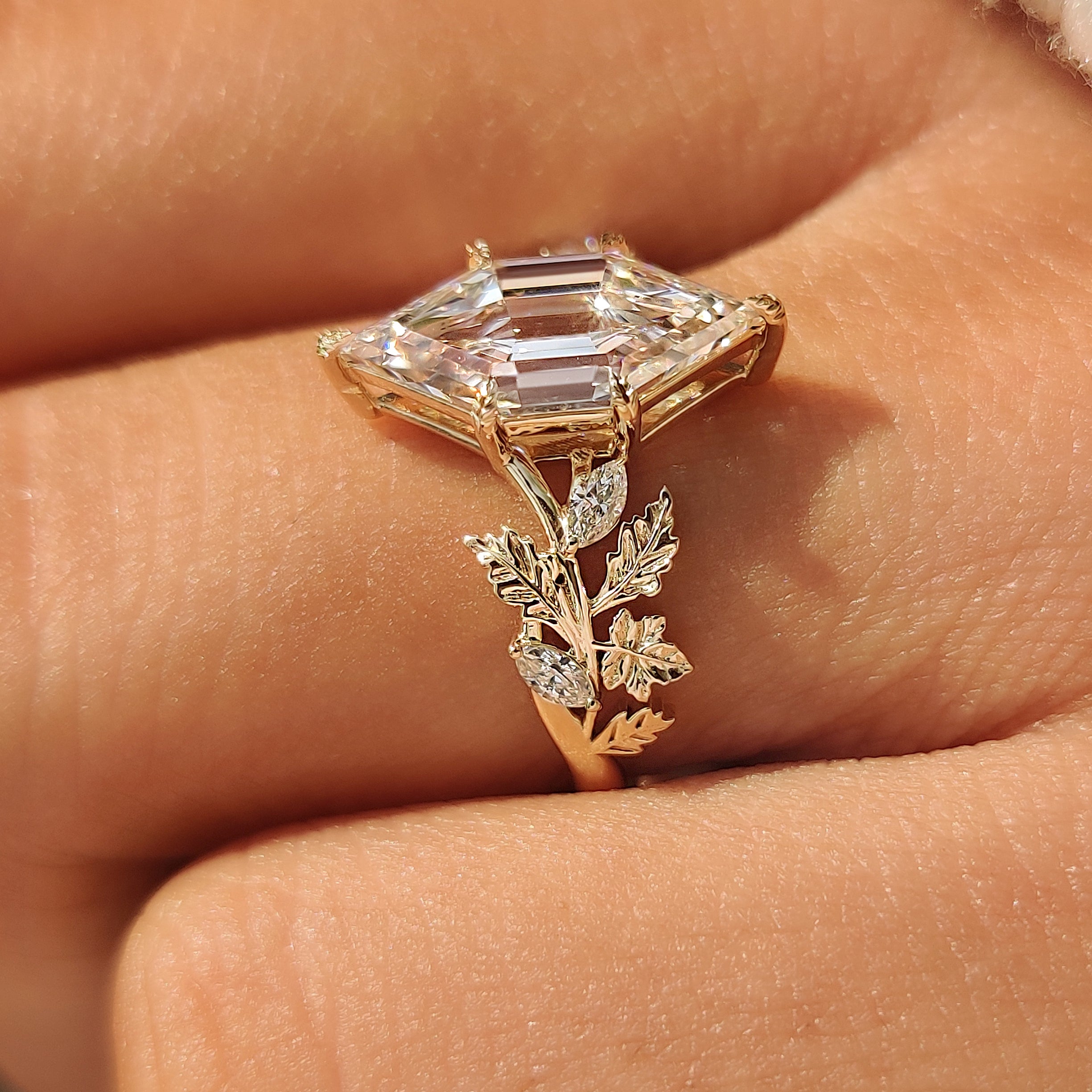 Autumn leaf and vine band design on a nature inspired engagement ring.
