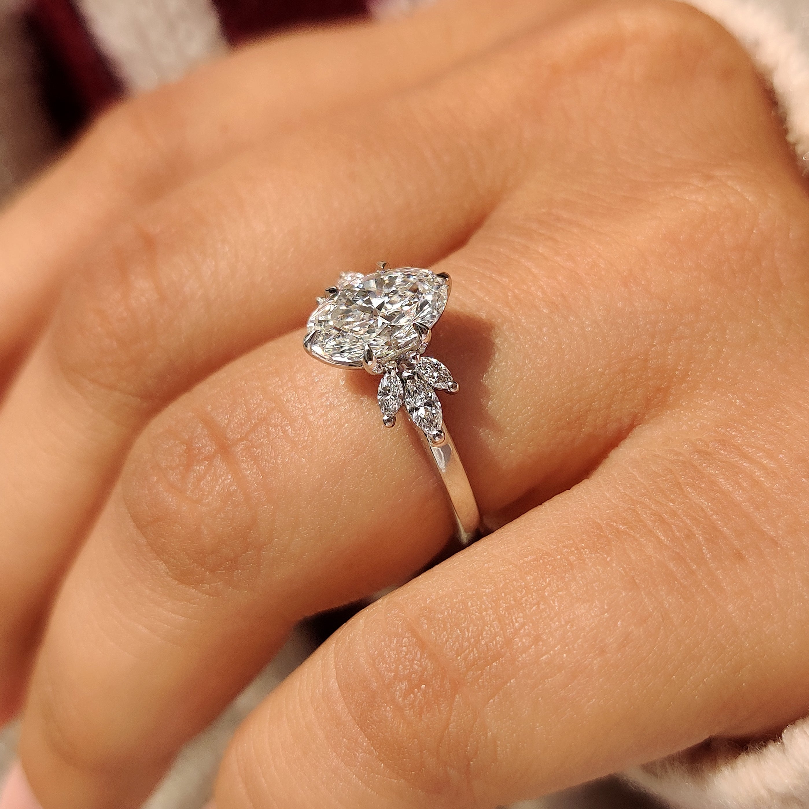 Oval diamond ring with six claw prong setting design

