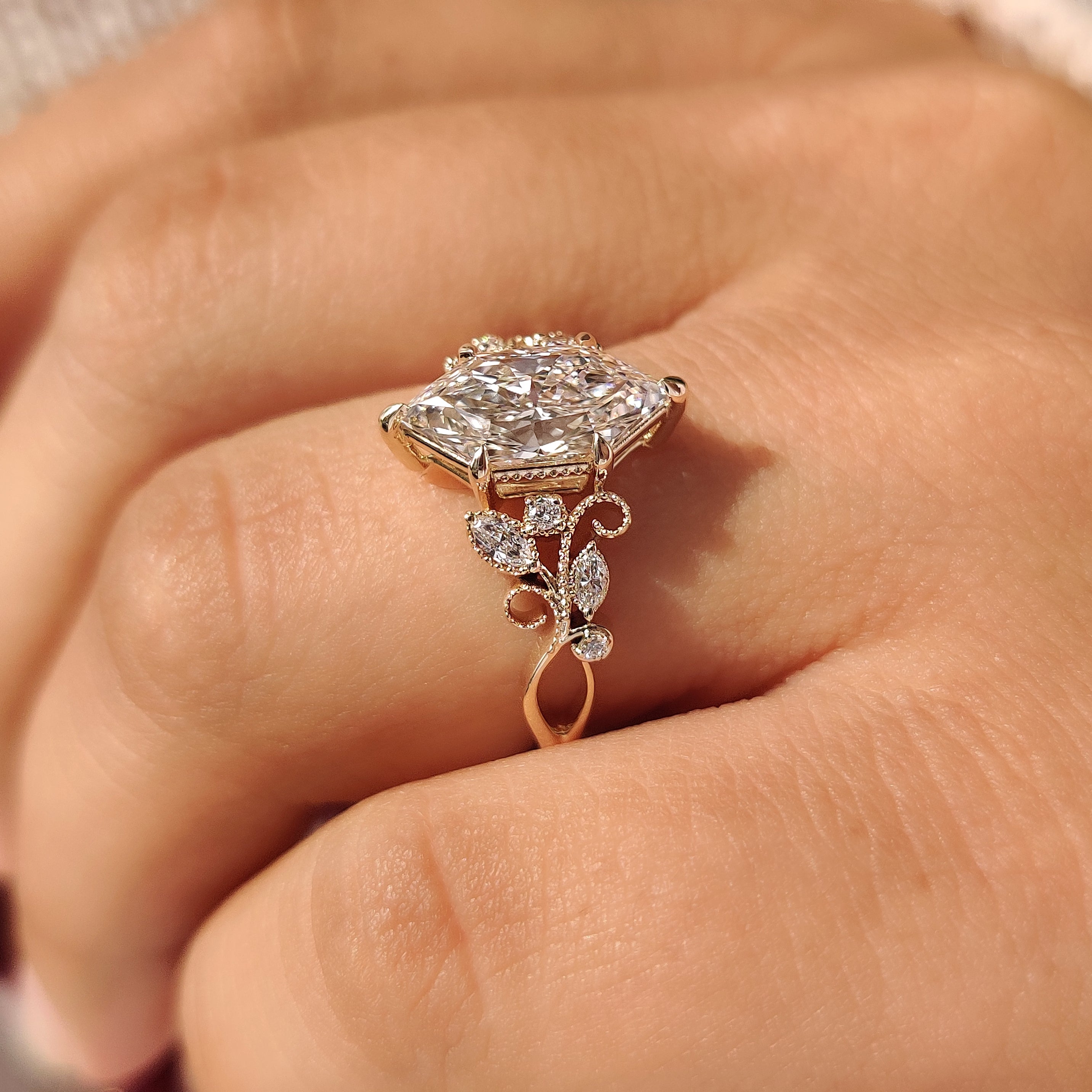 Nature inspired dutch marquise ring with leaf and vine shank
