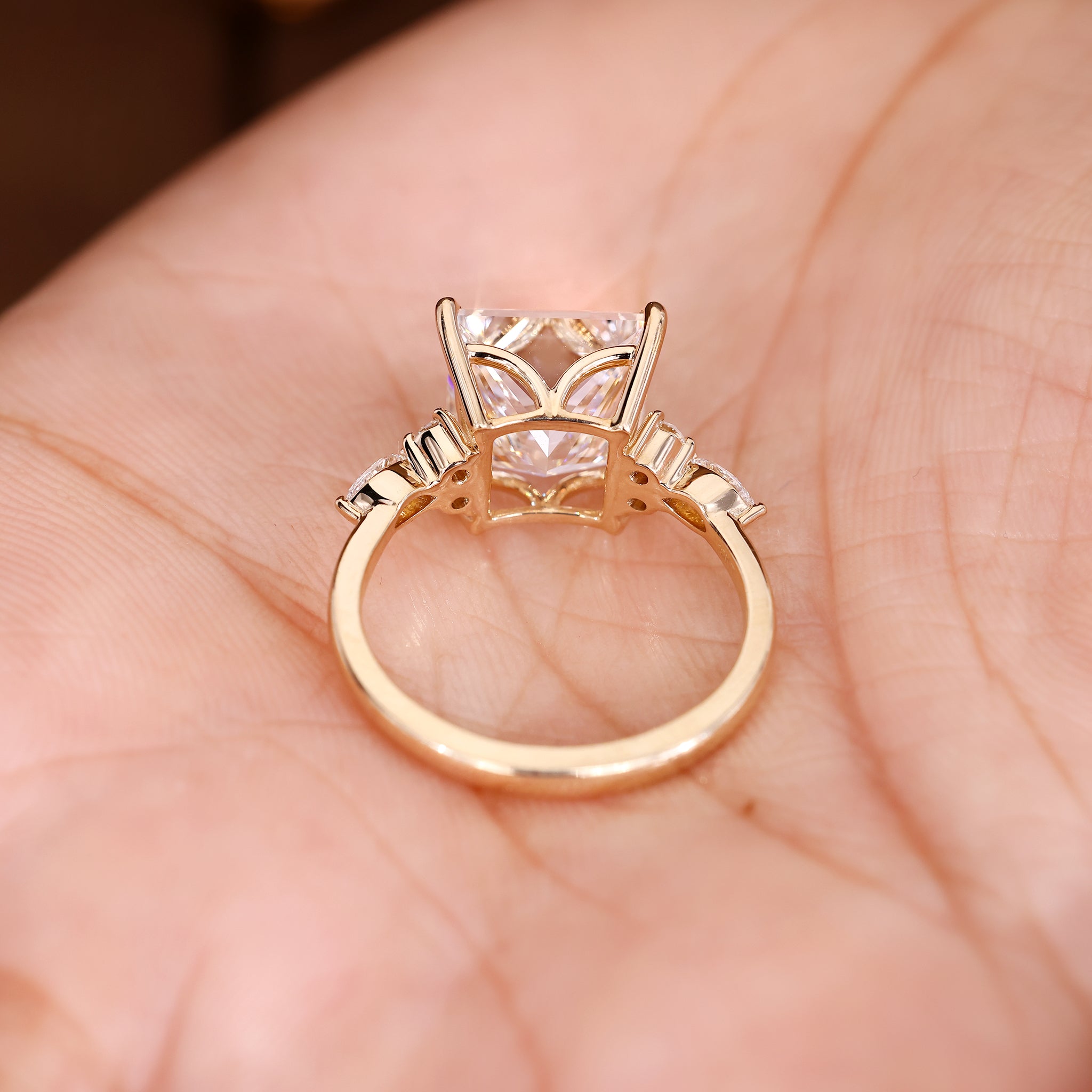 Carat Diamonds princess cut diamond ring with muse setting.
