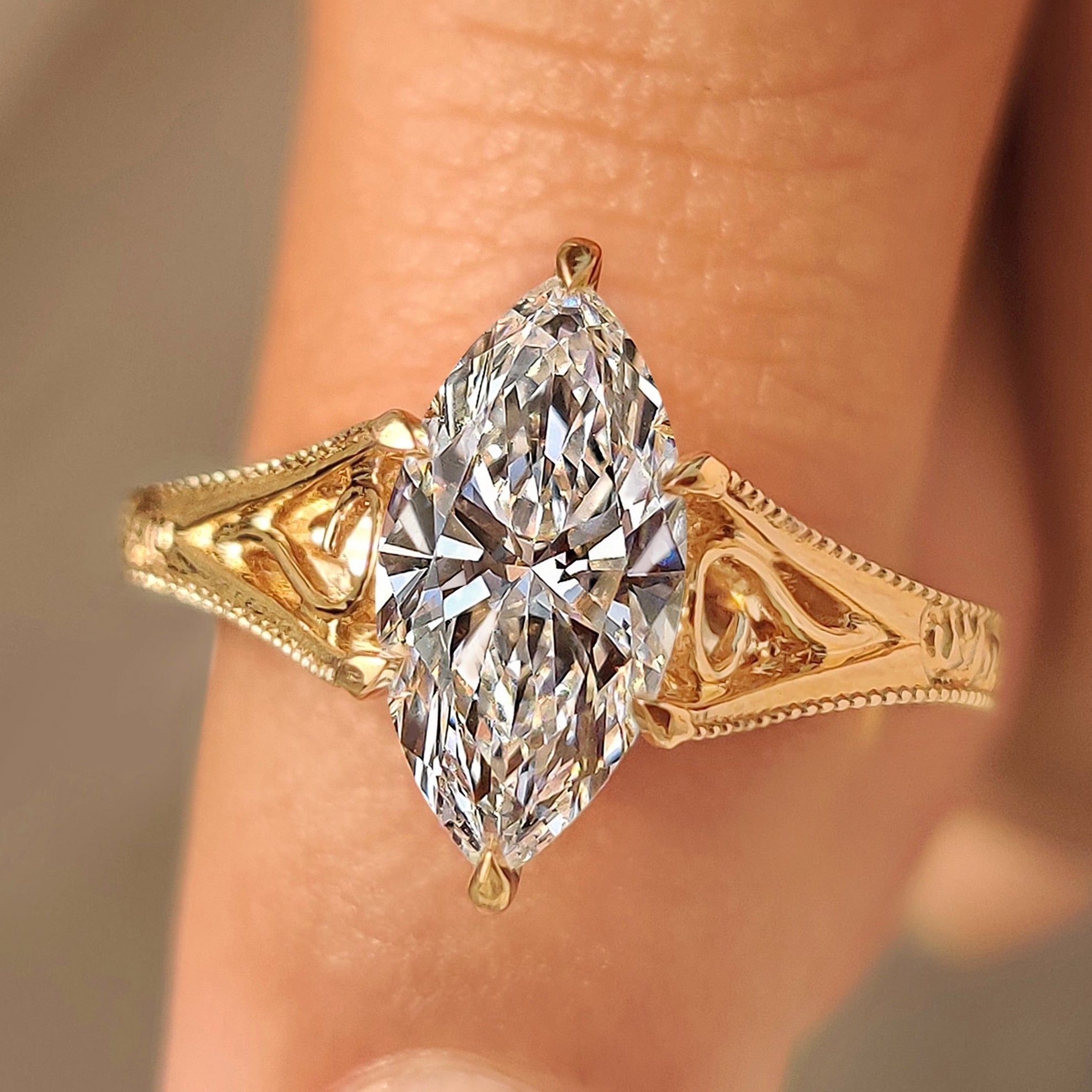 Solitaire Style Marquise Cut Diamond Ring in Milgrain Details