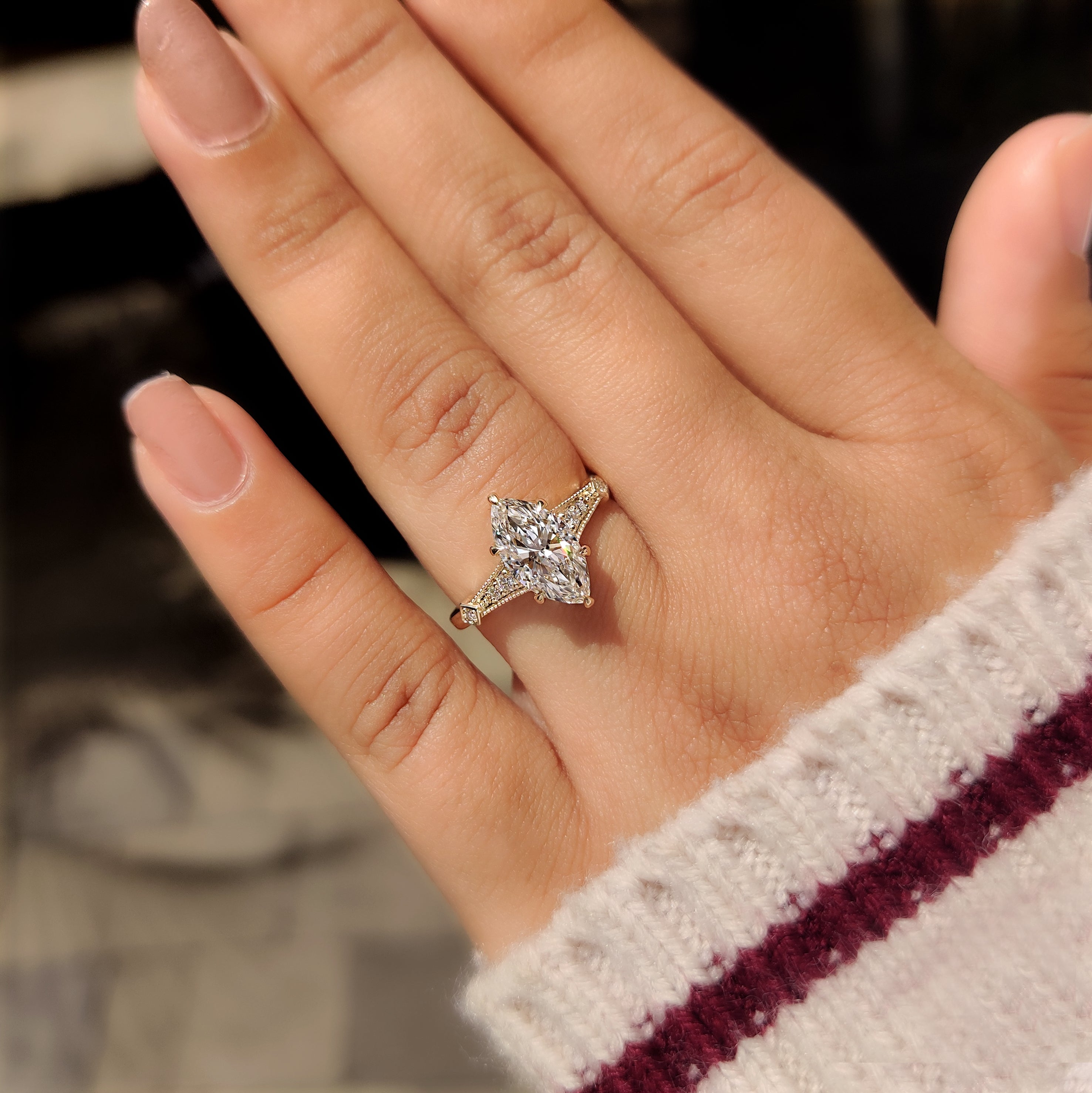 Handmade marquise diamond ring with six claw prong setting.
