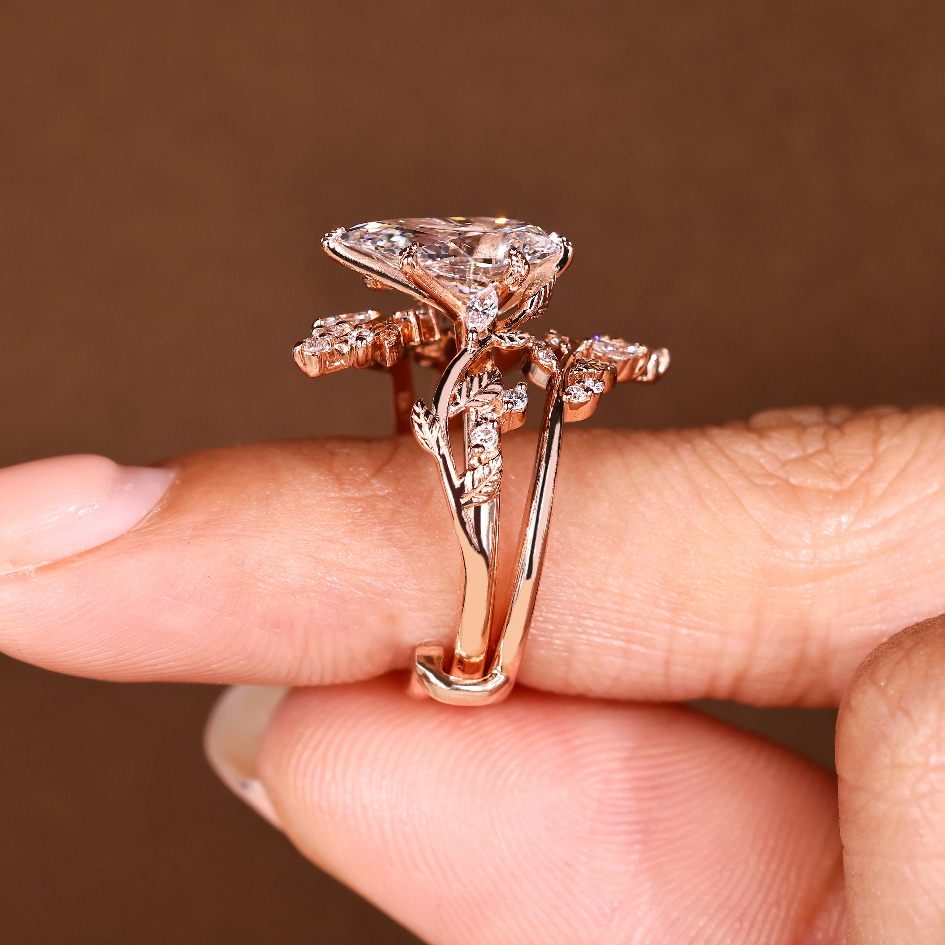 Lab grown pear ring with marquise and round accents
