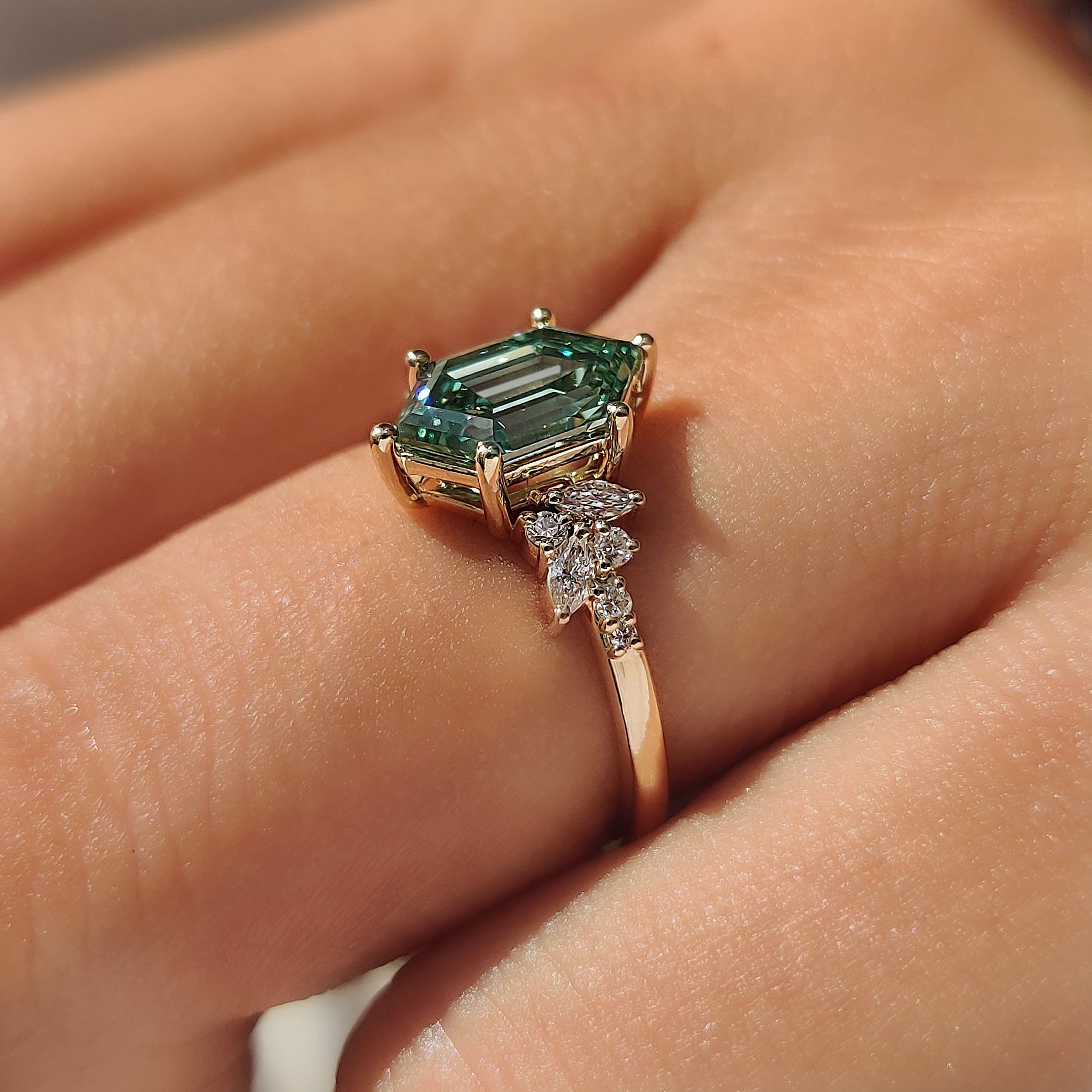 Green Hexagon Step Cut Ring with Marquise and Round Cluster Setting