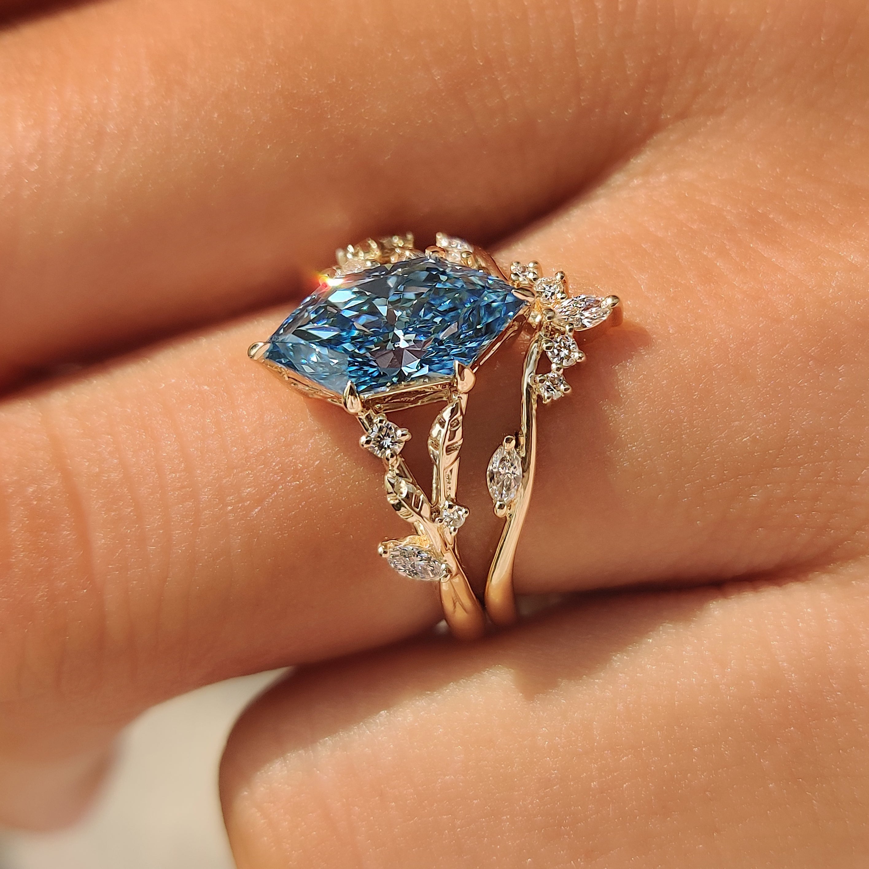 Handcrafted Dutch marquise ring with custom wedding band by Carat Diamonds.

