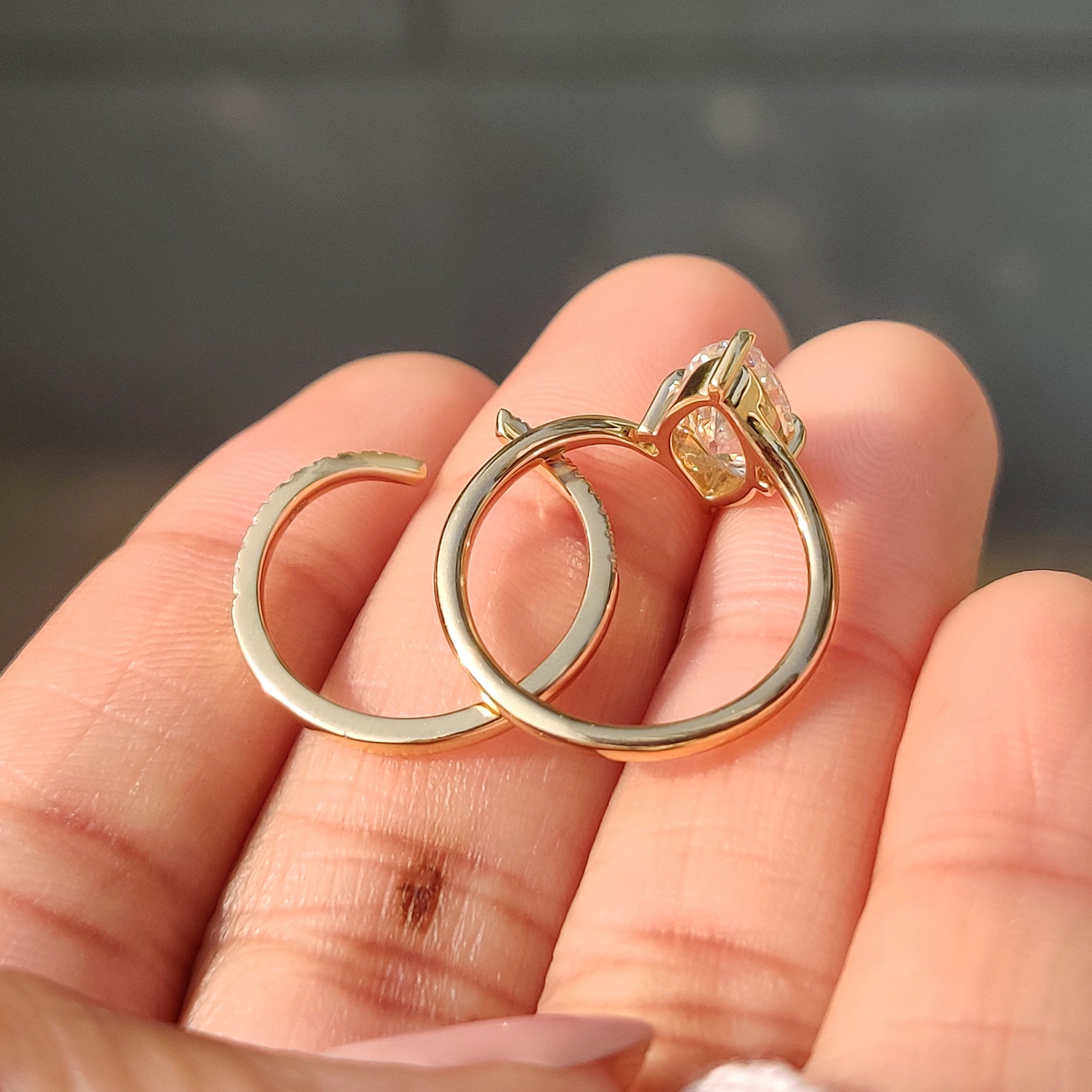 Solitaire style marquise ring paired with round diamond band
